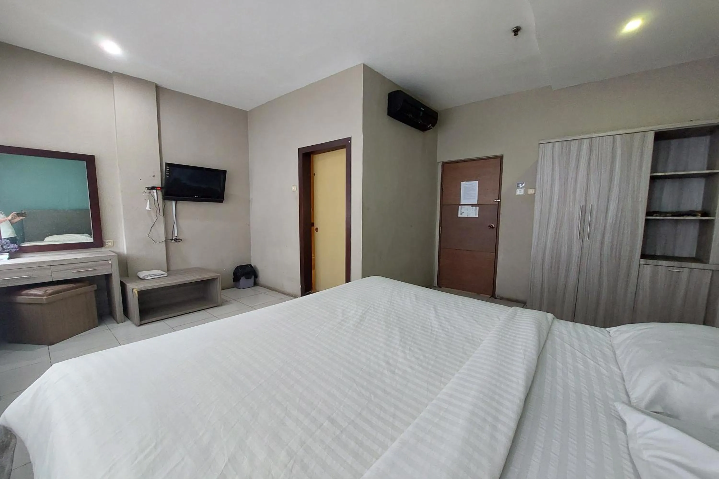 Bed in Hotel Bumi Malaya