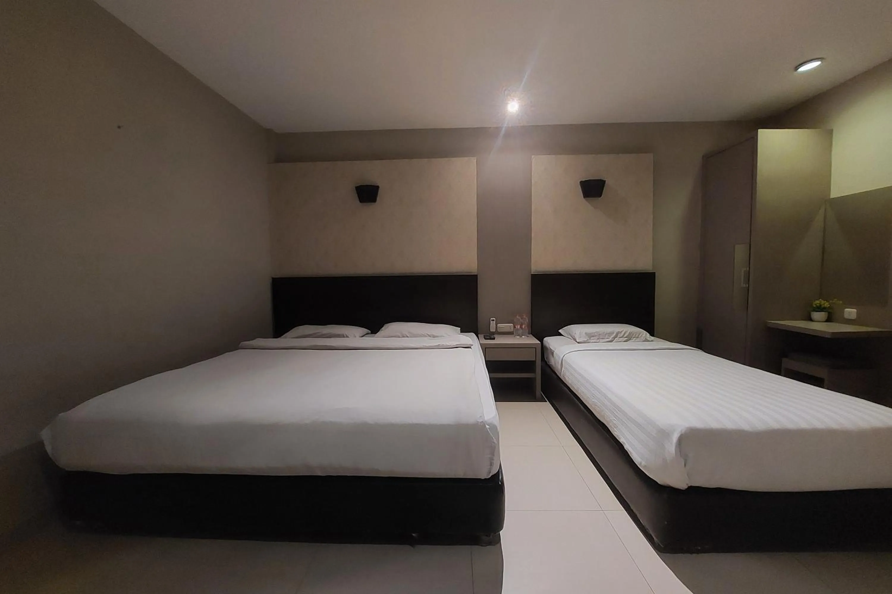 Bed in Hotel Bumi Malaya
