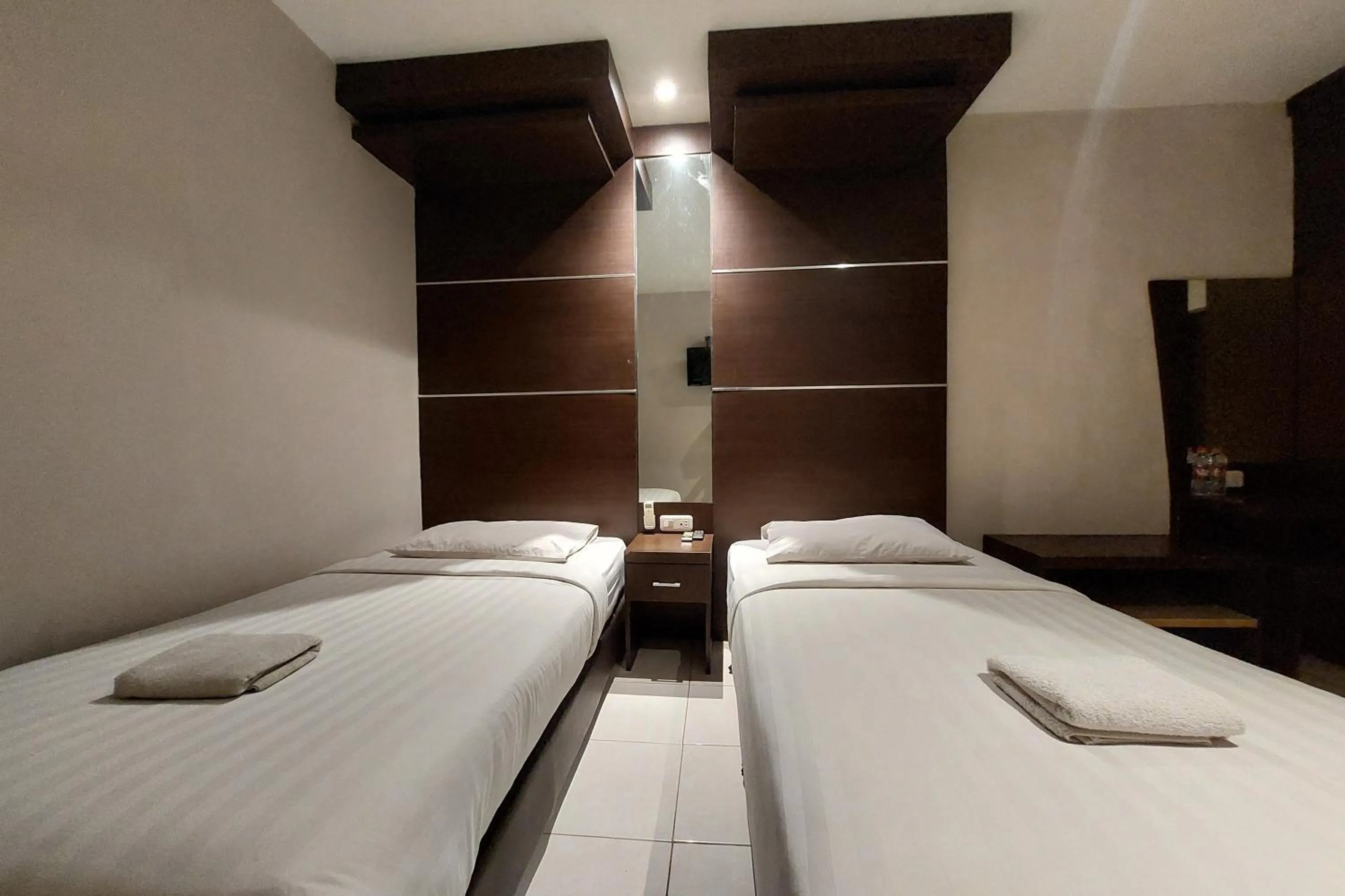 Bed in Hotel Bumi Malaya