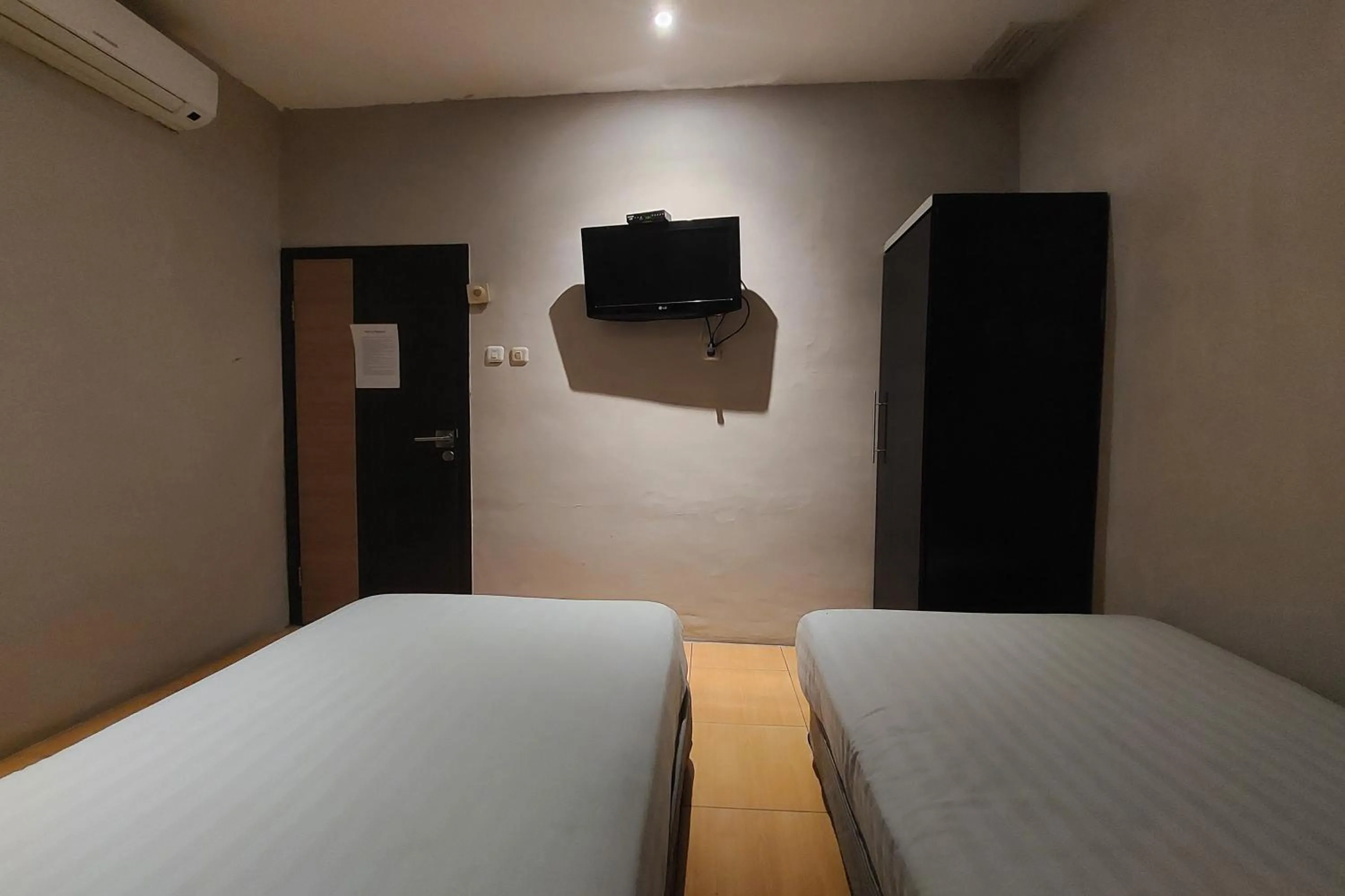 Bed in Hotel Bumi Malaya