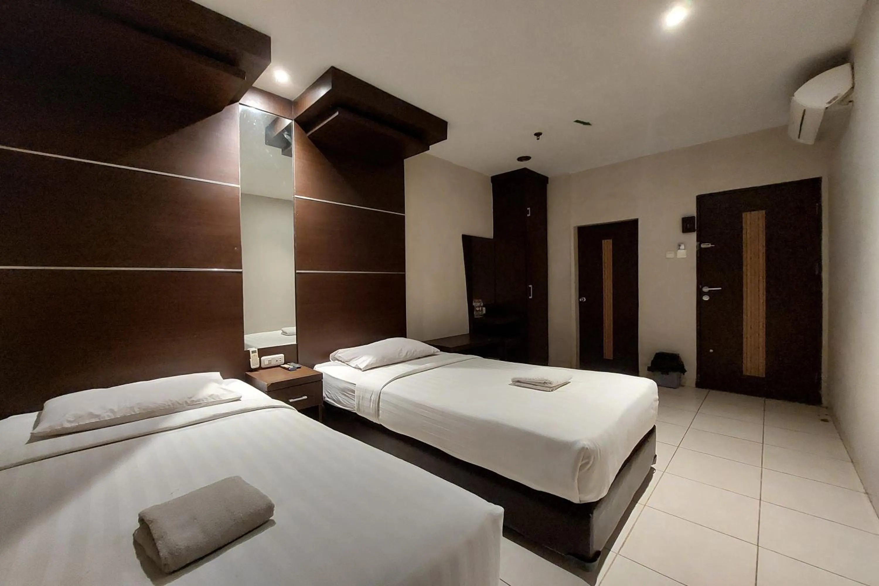 Bed in Hotel Bumi Malaya