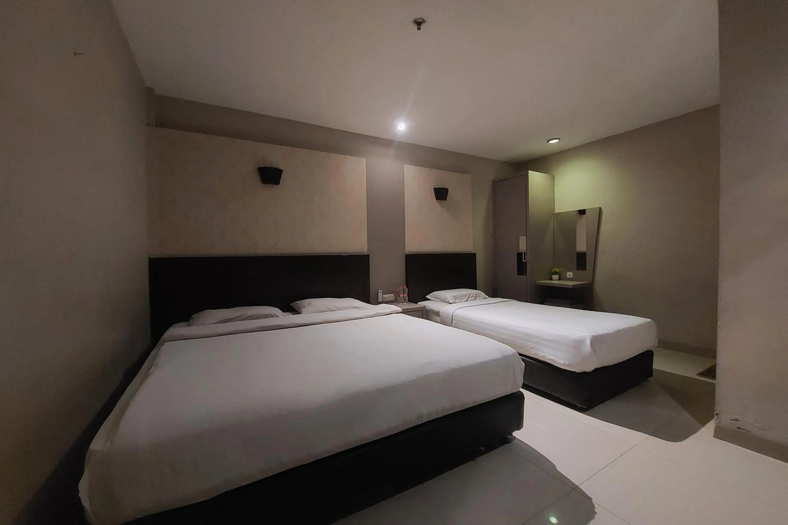 Bed in Hotel Bumi Malaya