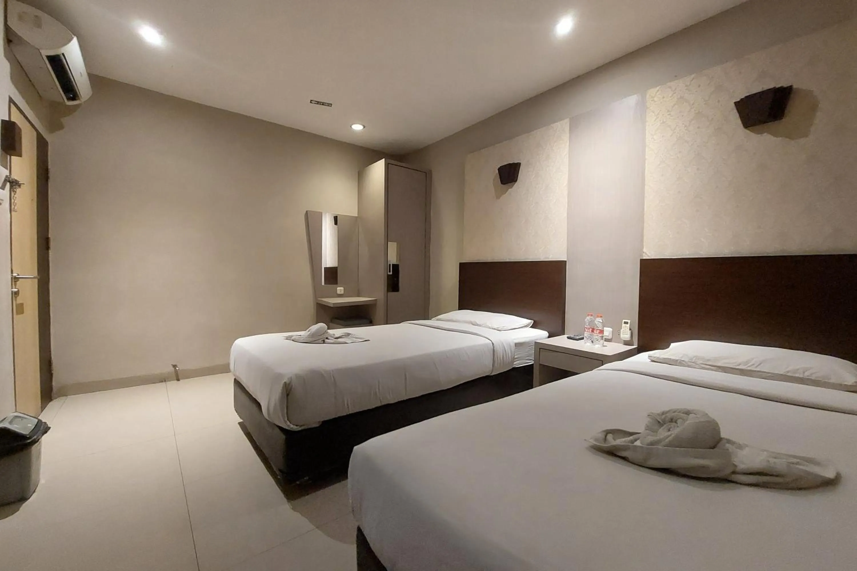 Bed in Hotel Bumi Malaya