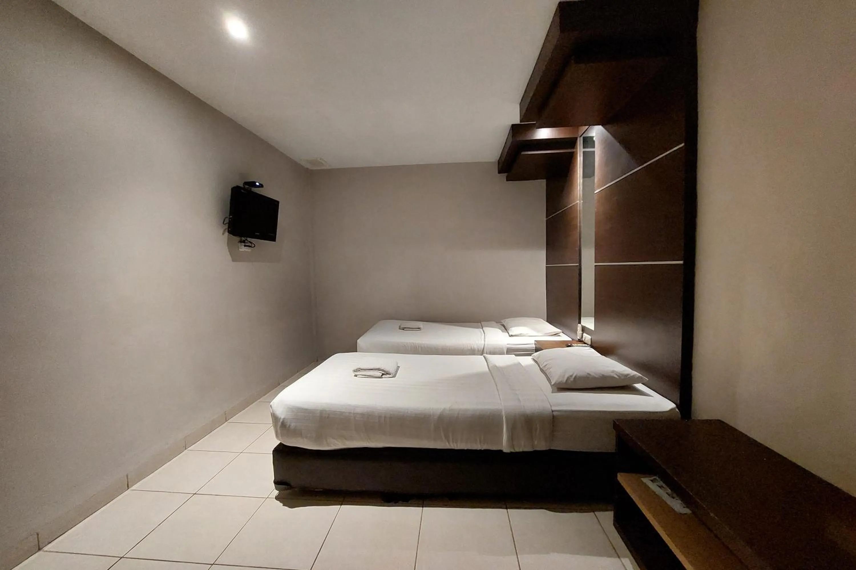 Bed in Hotel Bumi Malaya