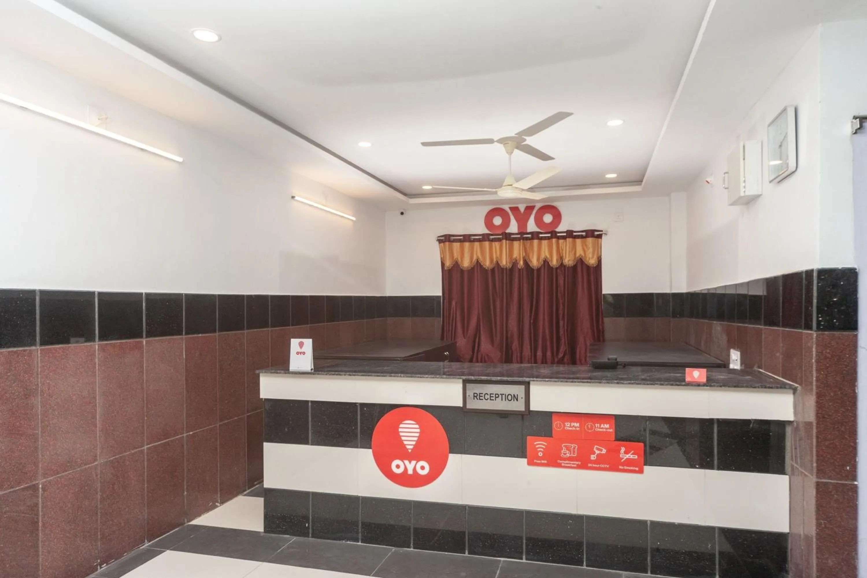 Lobby or reception in Capital O Srinivasa Residency