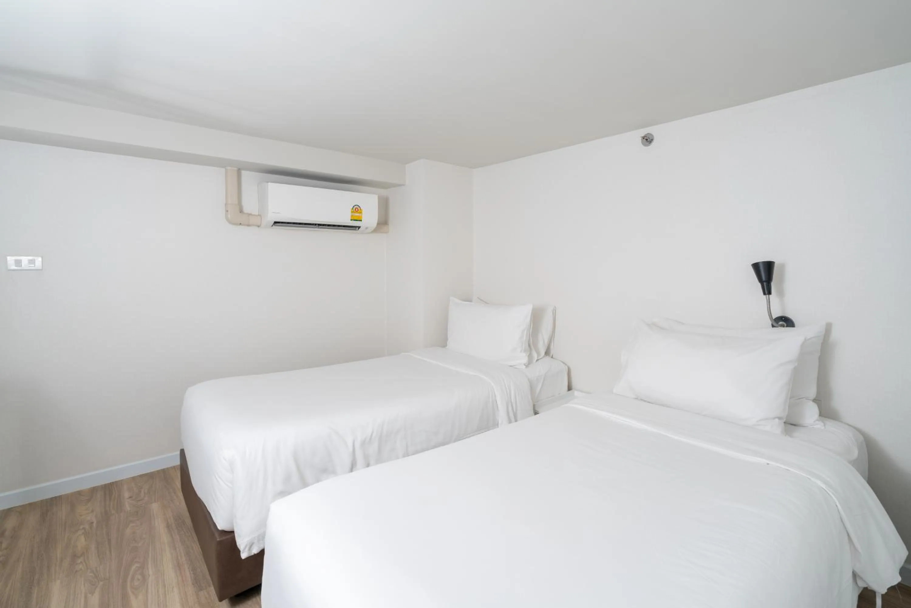 Bed in Q-Box Hotel Bangkok Blossom (SHA Plus)