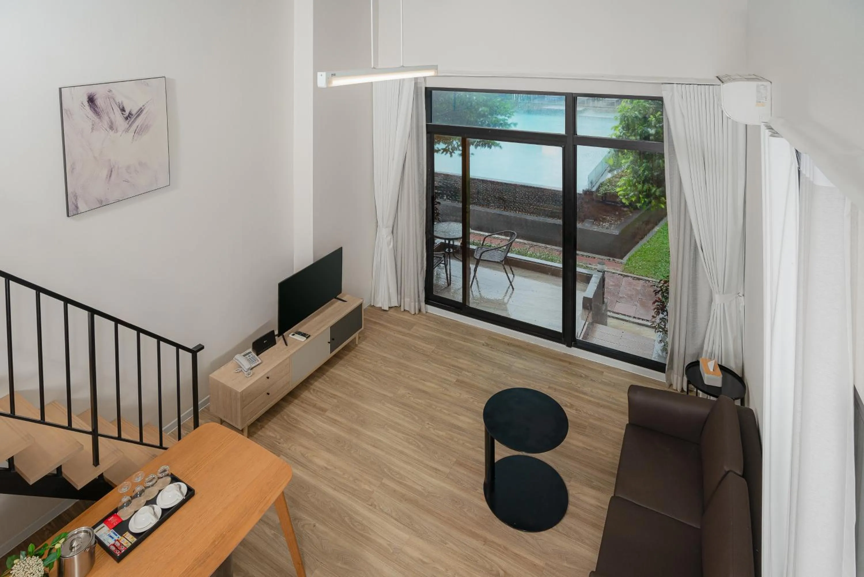 Seating Area in Q-Box Hotel Bangkok Blossom (SHA Plus)