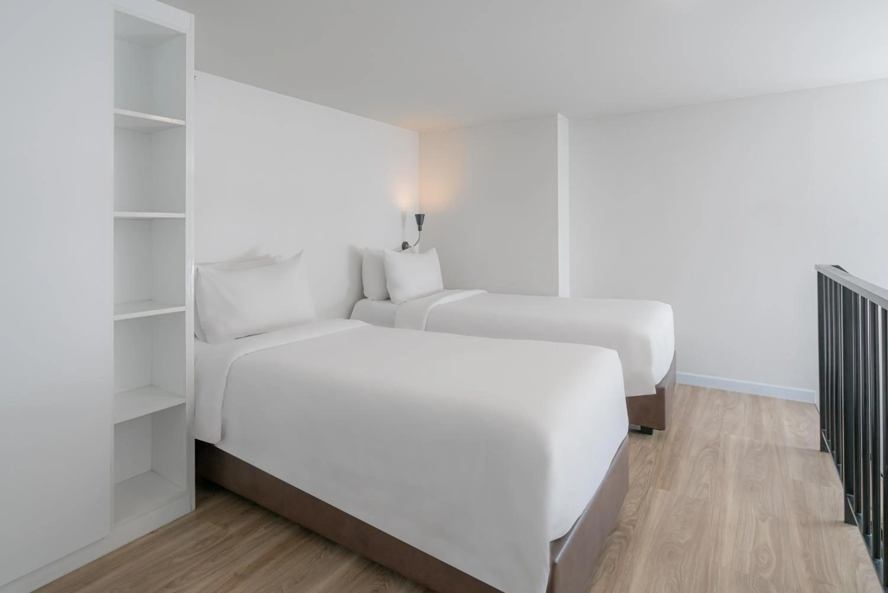 Bed in Q-Box Hotel Bangkok Blossom (SHA Plus)