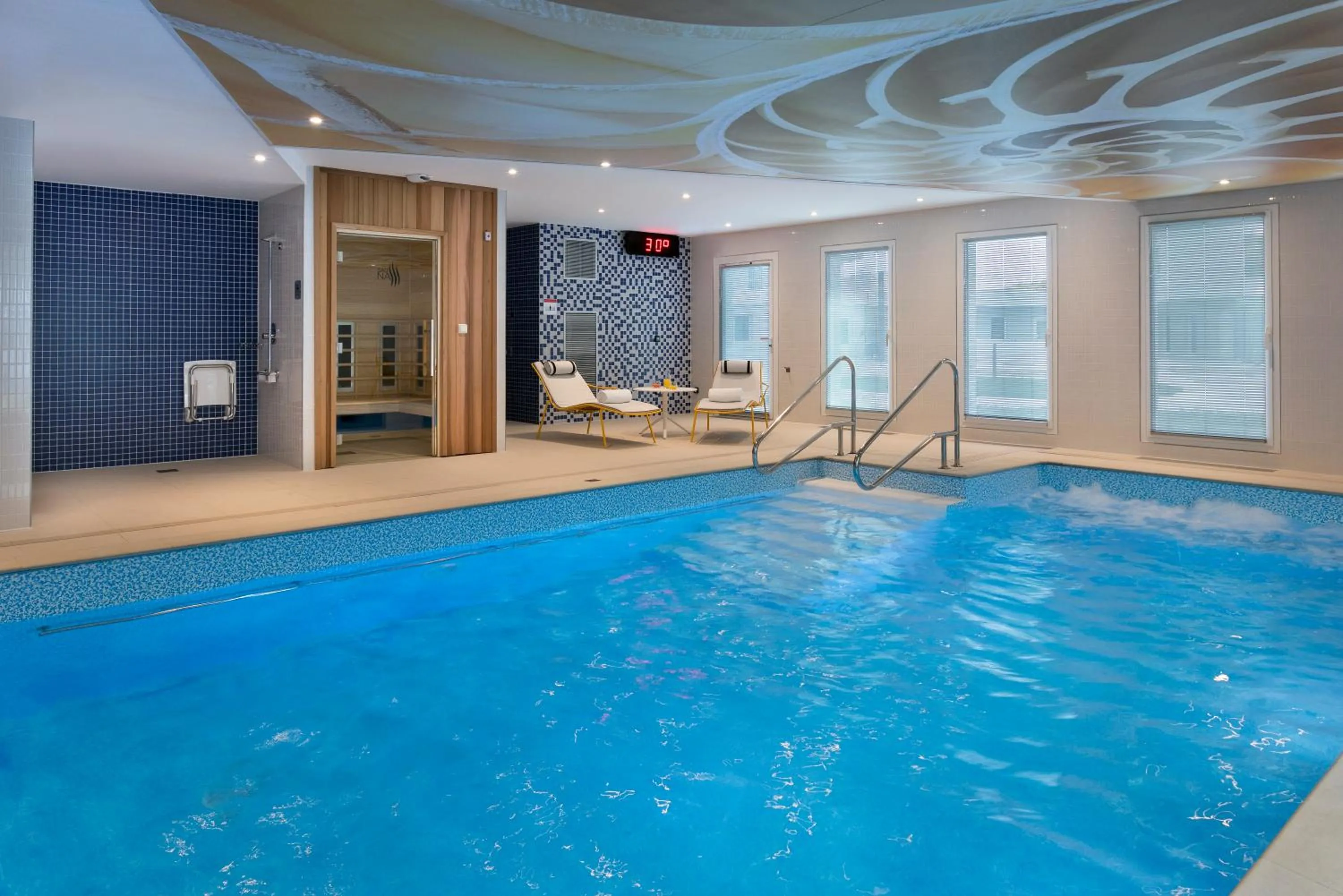 Swimming pool in Citadines Confluent Nantes