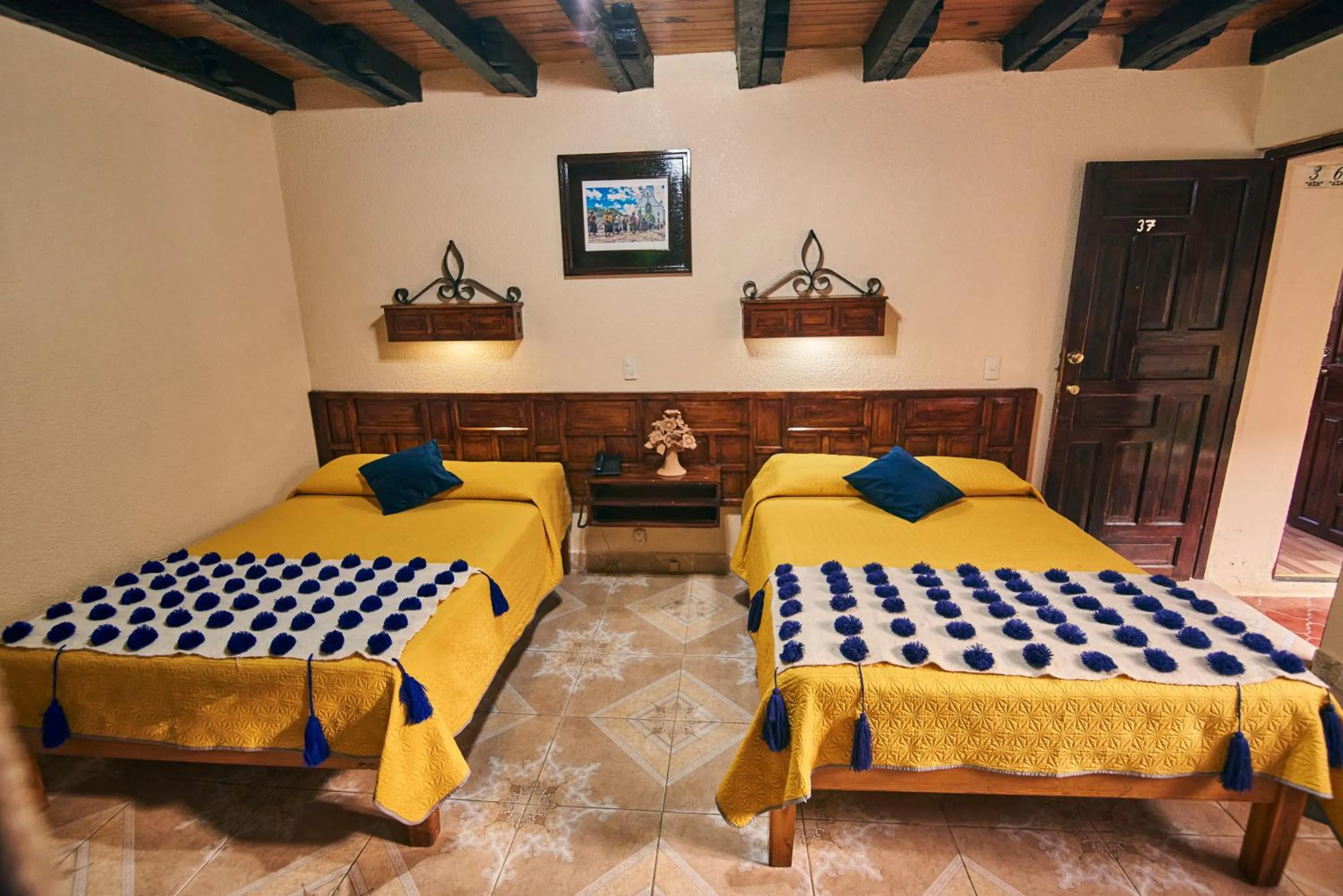 Bed in Hotel Palacio de Moctezuma