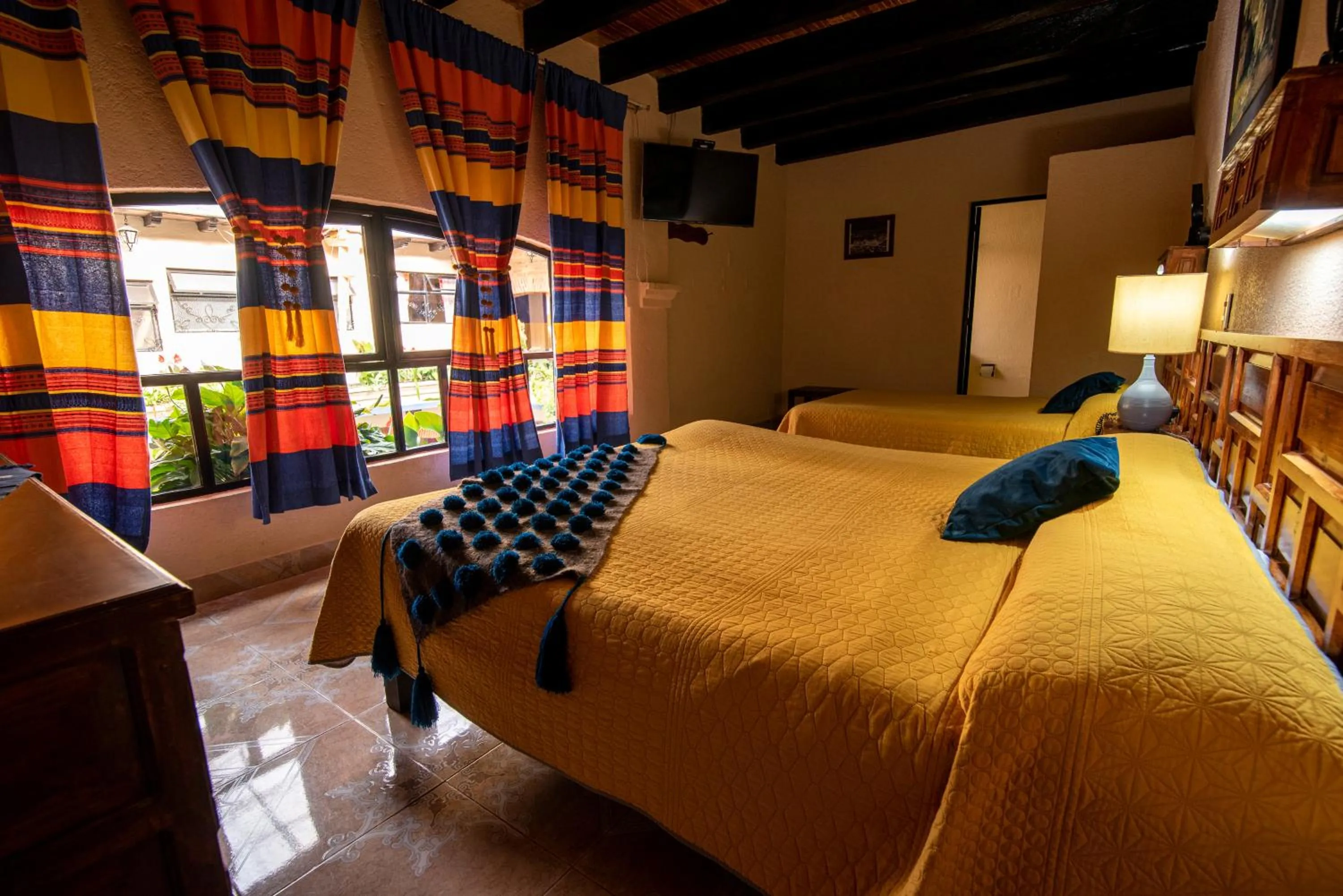 Bed in Hotel Palacio de Moctezuma