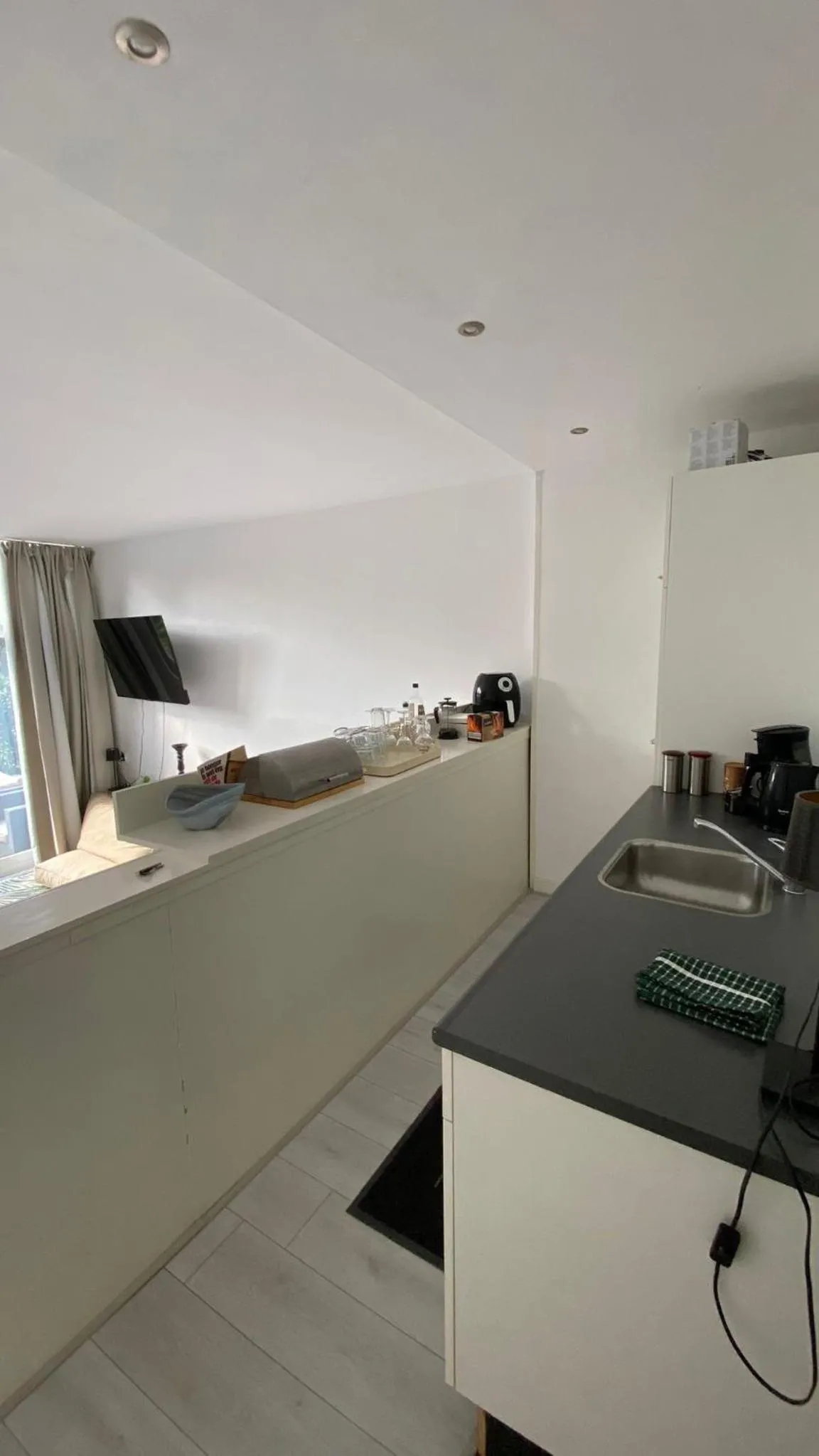 Kitchen or kitchenette in Canal Garden Apartment StayWell Amsterdam