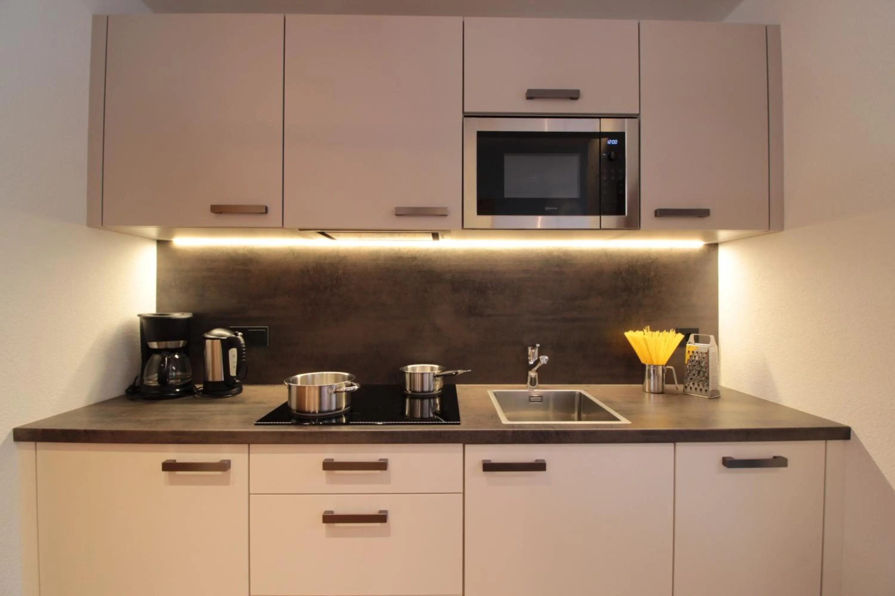 Kitchen or kitchenette in Appartement Hotel Erlhof Deluxe