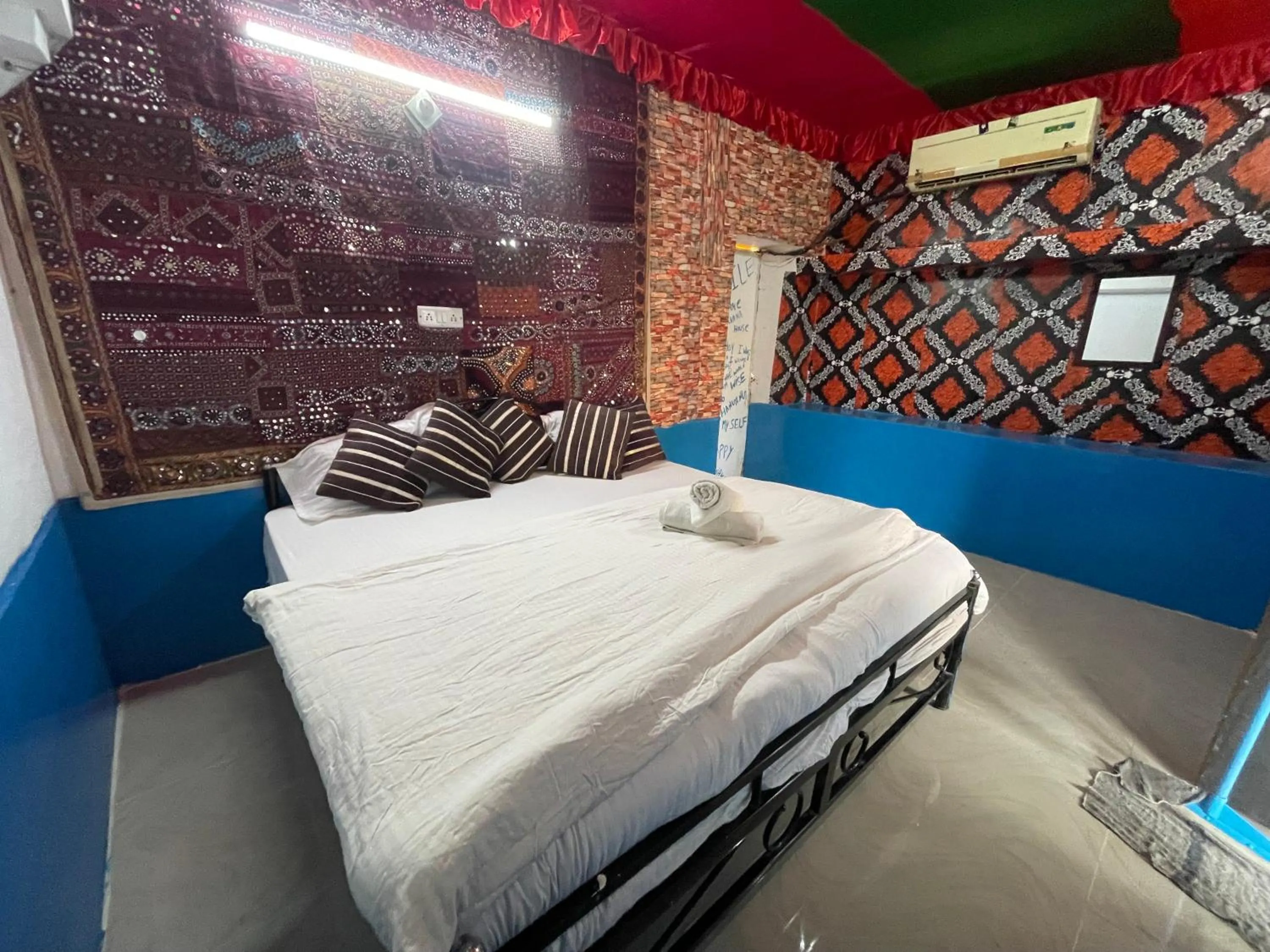 Bed in Mirvana Guest House & Camel safari