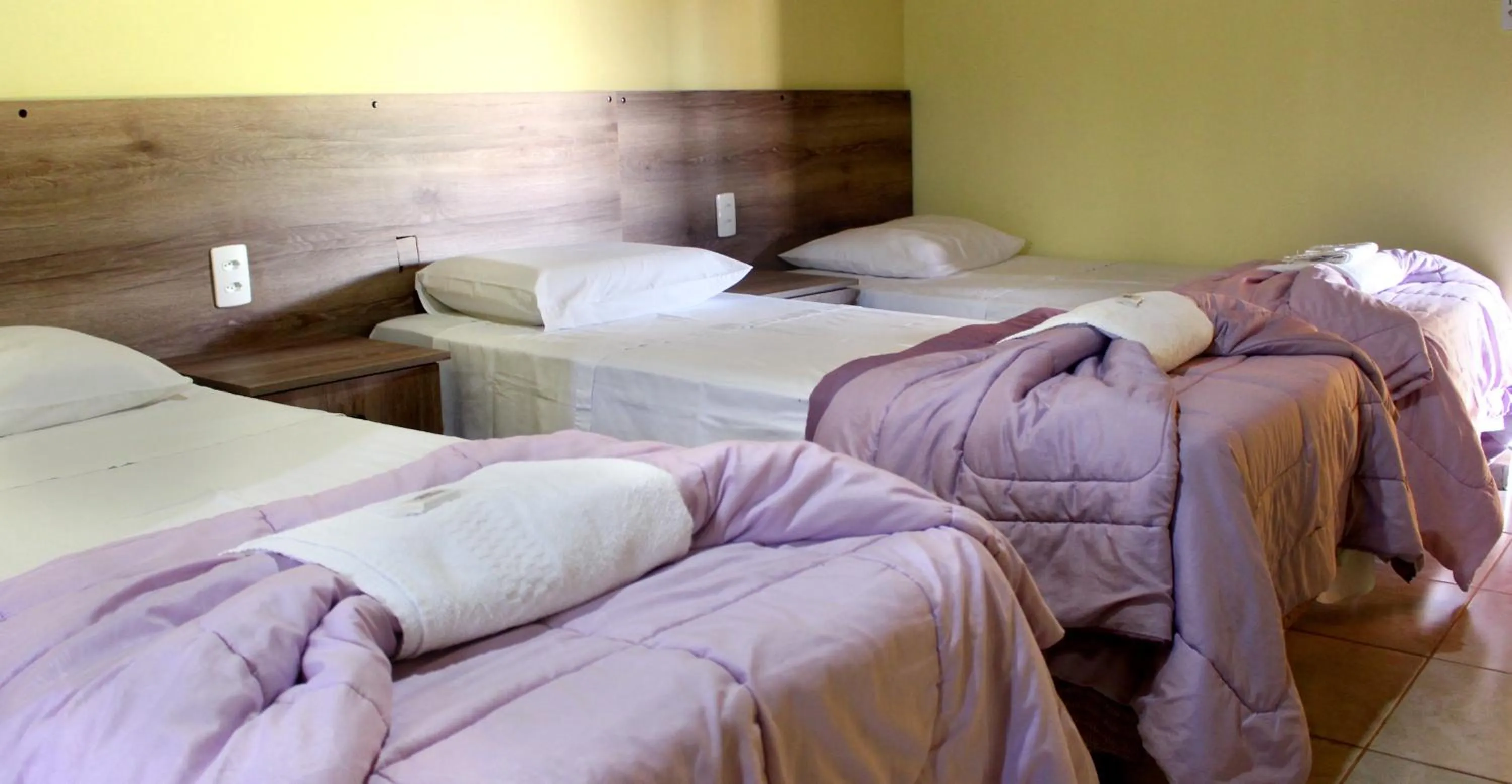 Bed in Pousada dos Guias