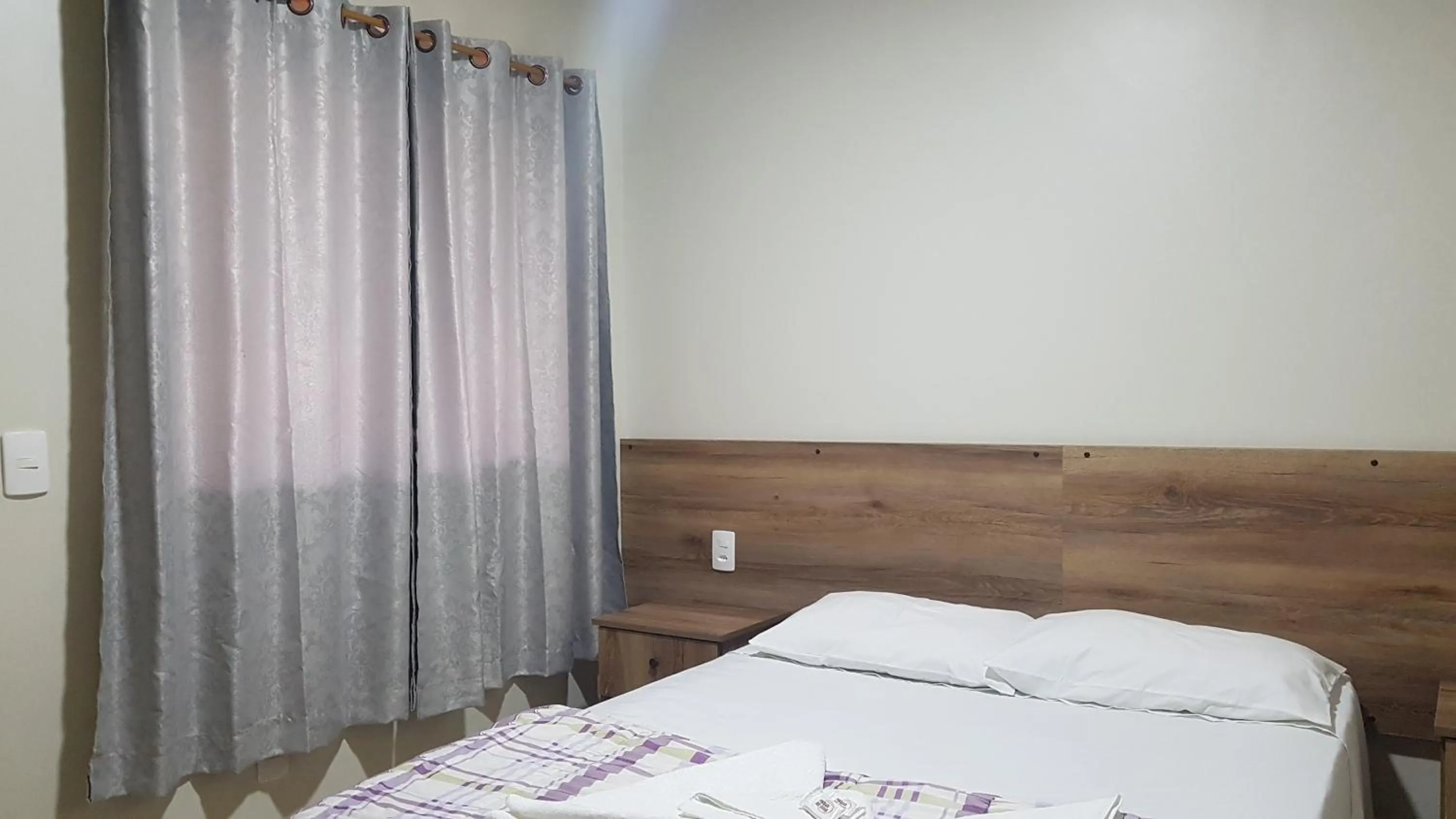 Bed in Pousada dos Guias