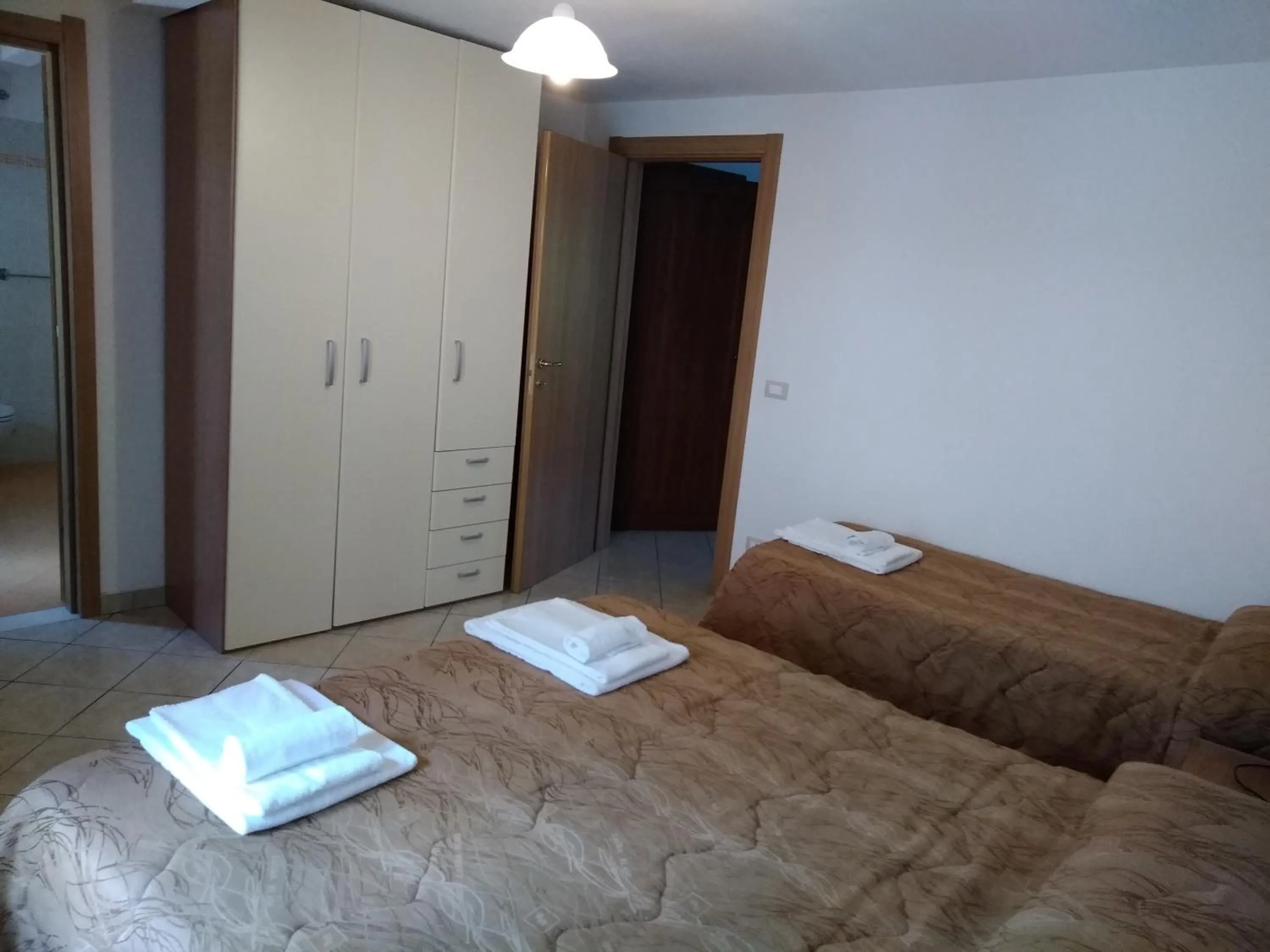 Bed in Il Narciso appartamenti