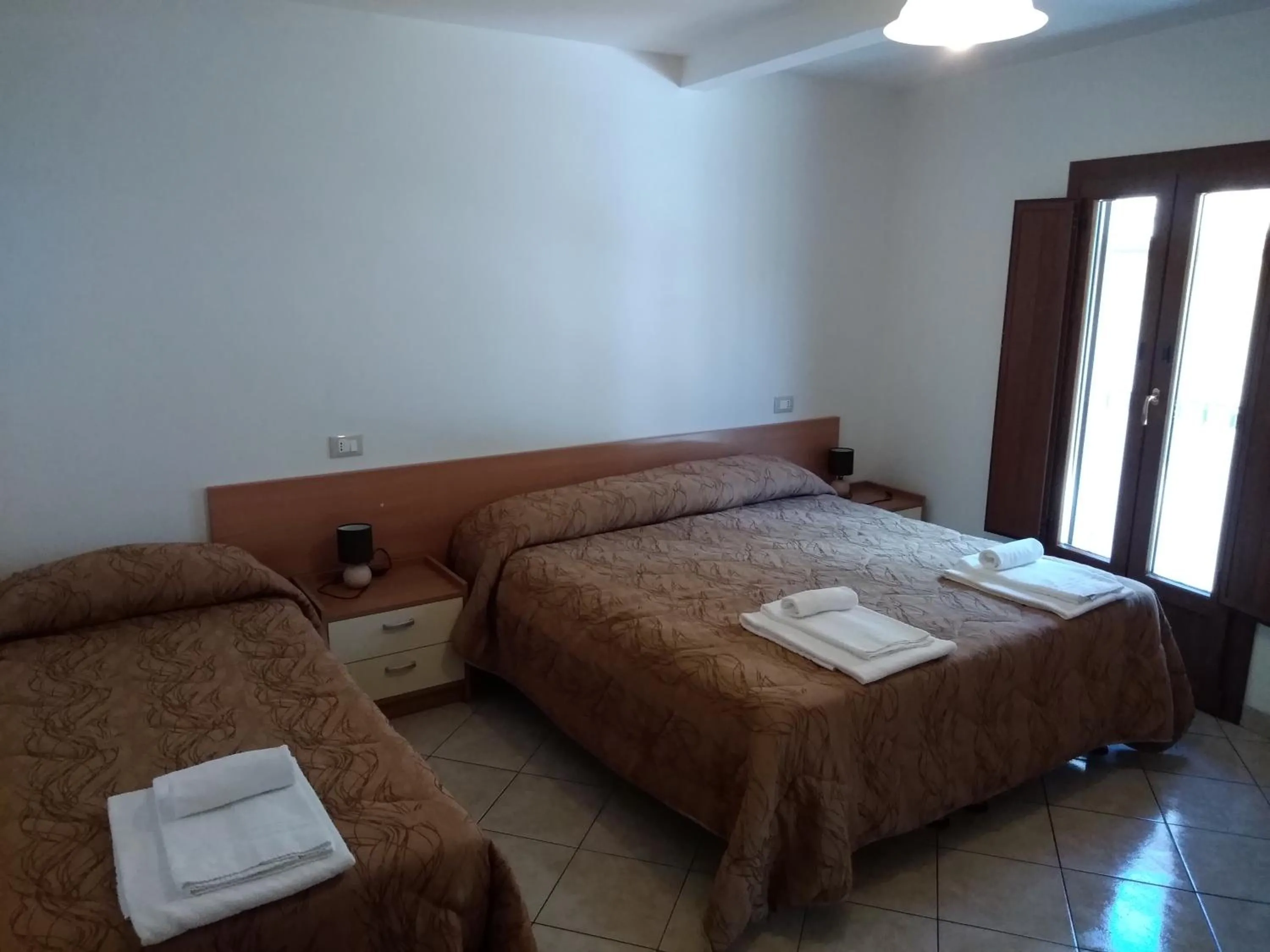 Bed in Il Narciso appartamenti