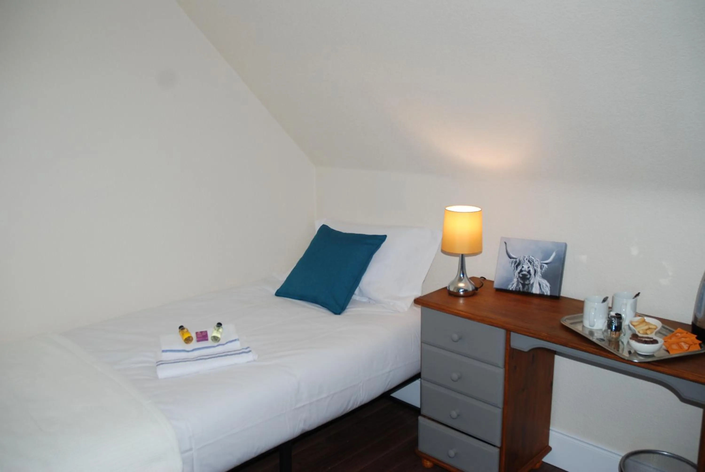 Bed in The Coo's Guest House