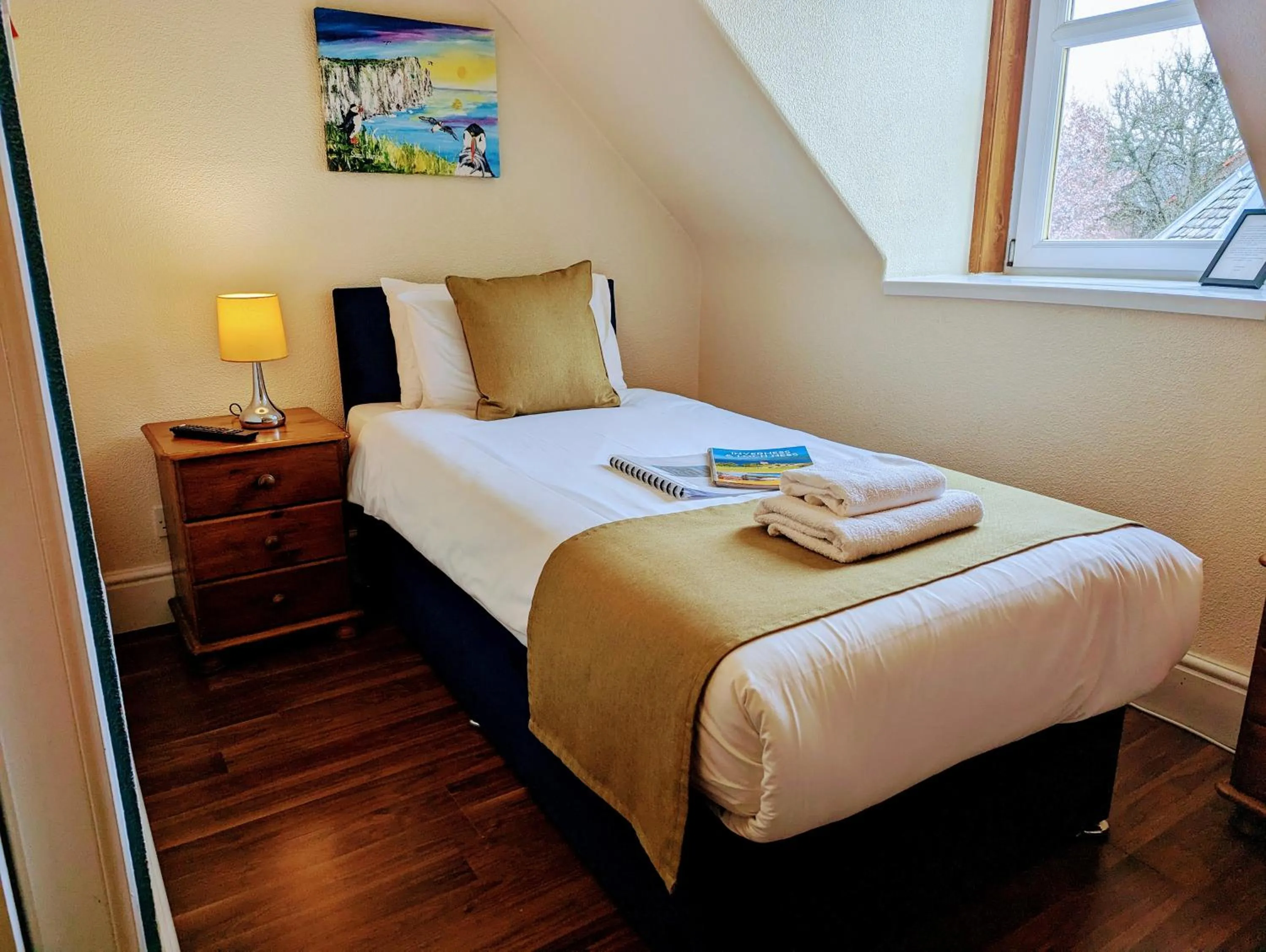 Bed in The Coo's Guest House