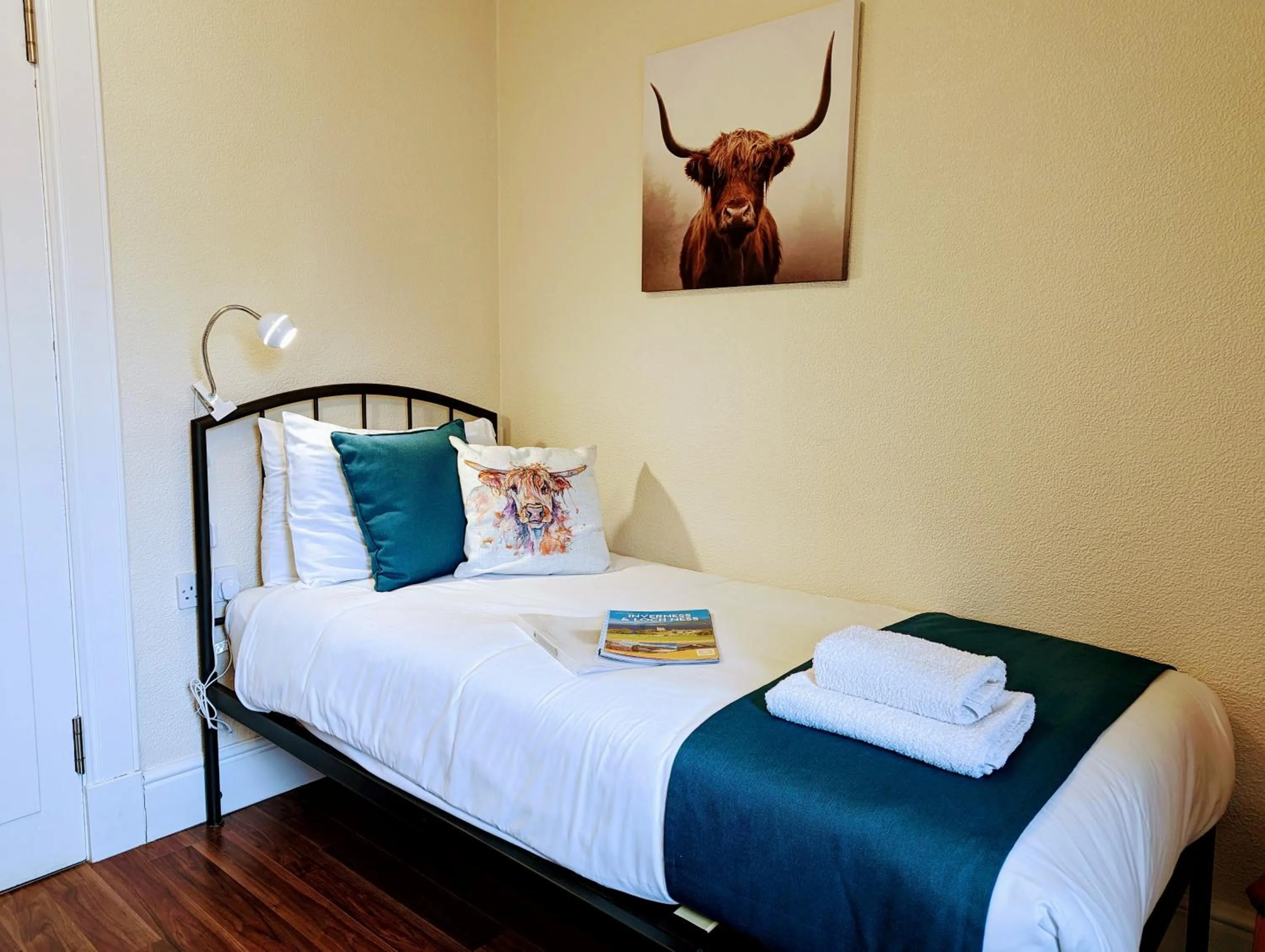 Bed in The Coo's Guest House