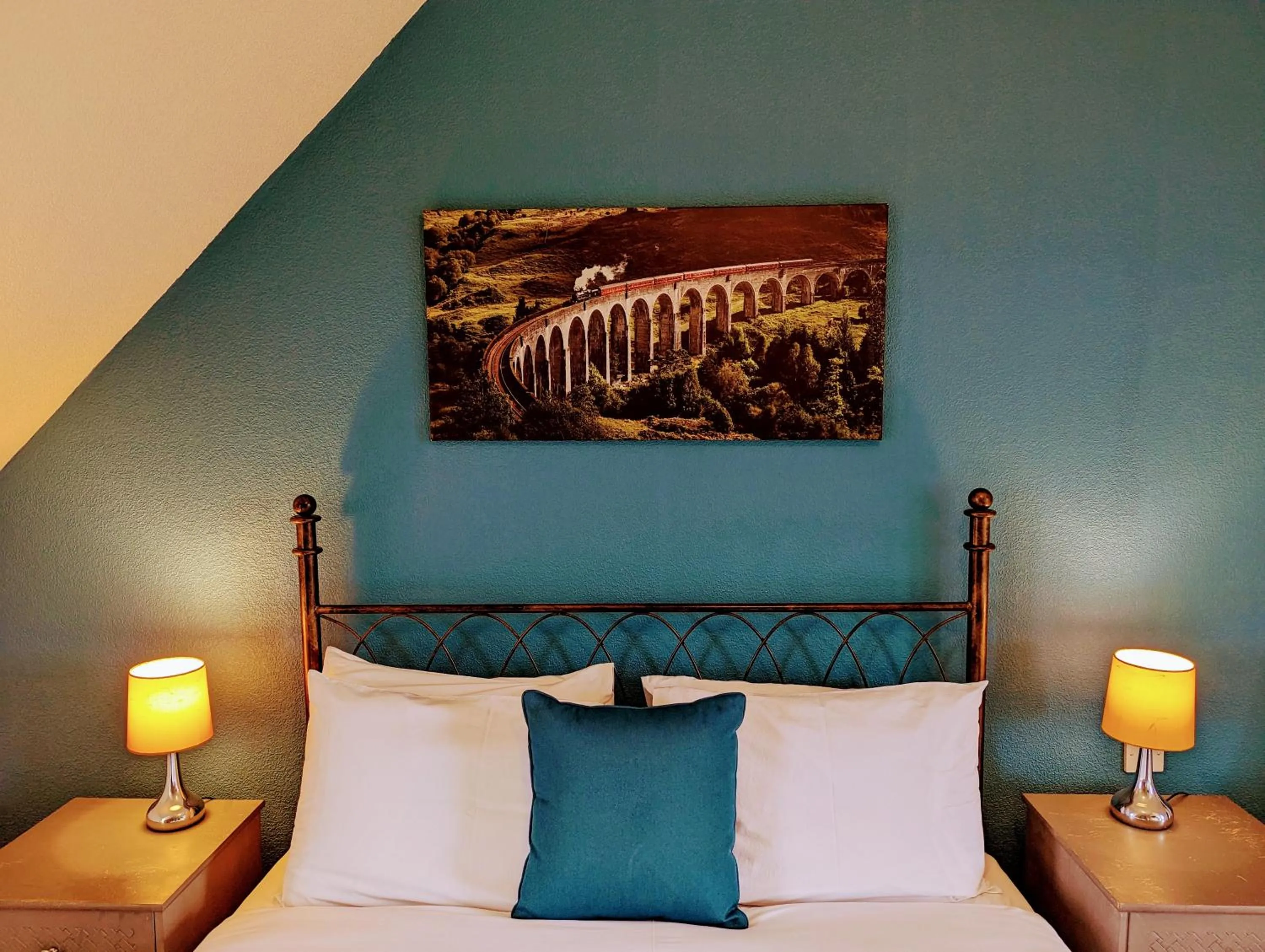 Bed in The Coo's Guest House