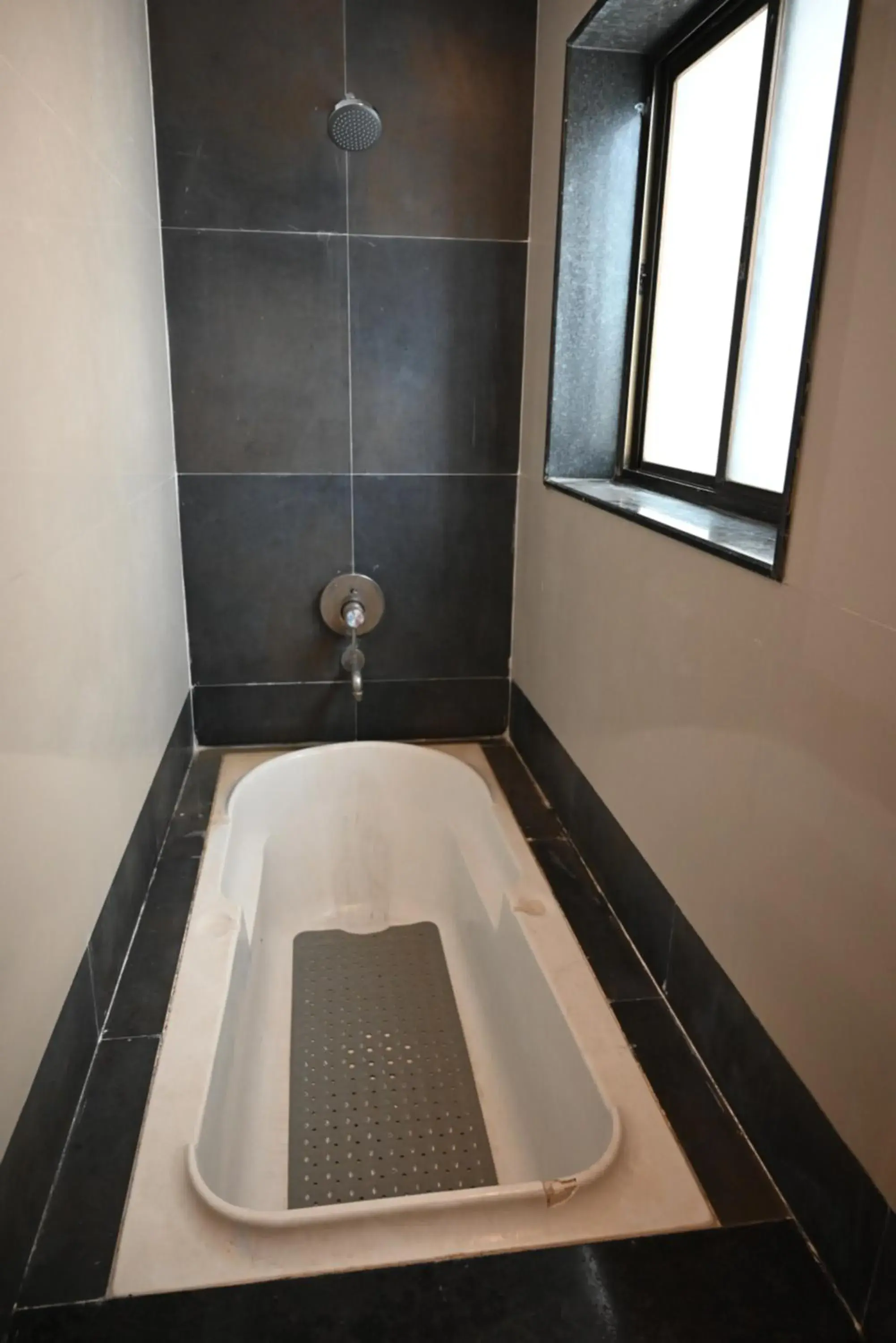 Premium Family Room with bath Tub in Hotel Shradha Saburi Palace Premium Family Room with bath Tub in Hotel Shradha Saburi Palace