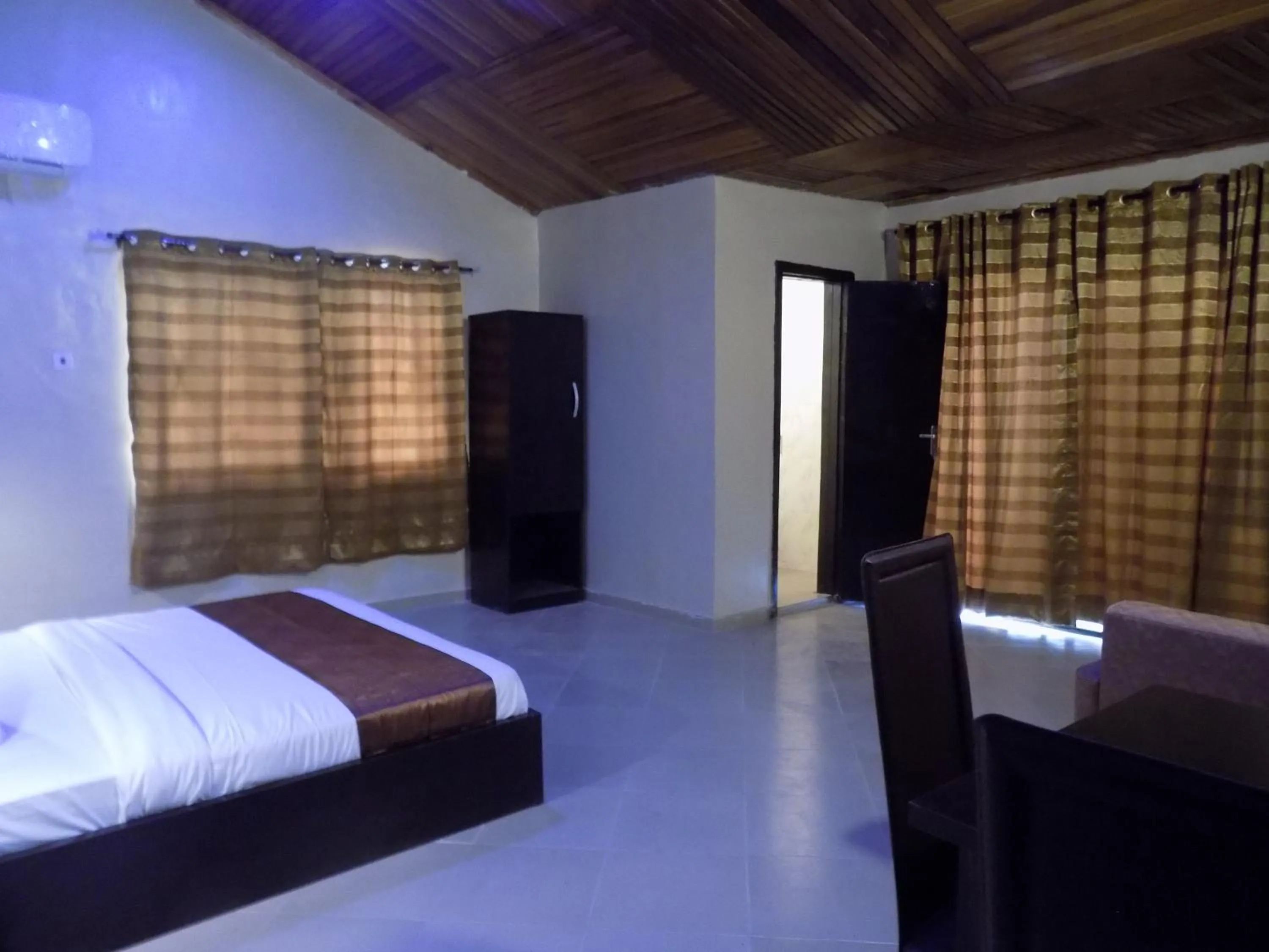 Photo of the whole room, Bed in Posh Apartments Business Hotel