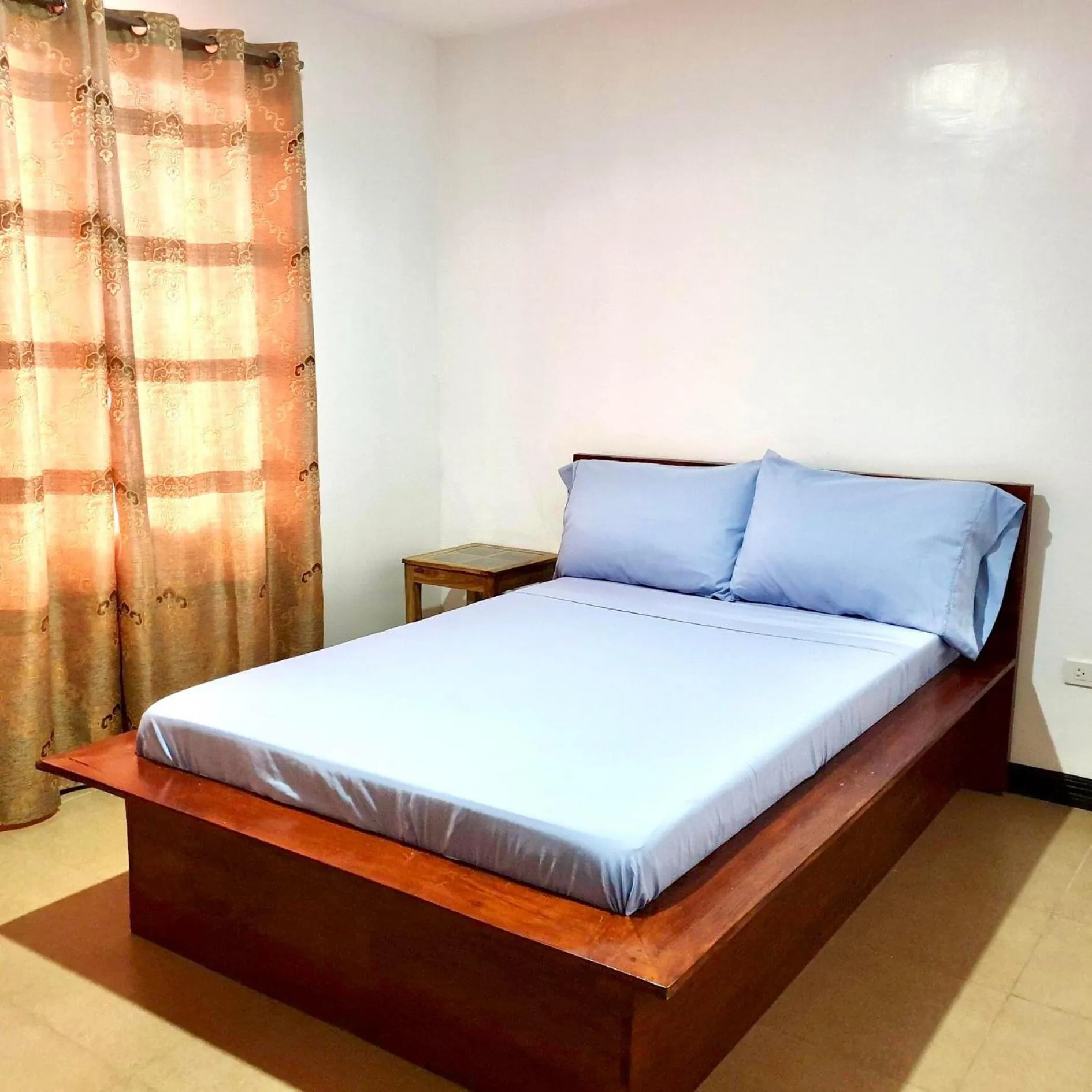 Bed in Panglao Village Court Apartment Stay Inn