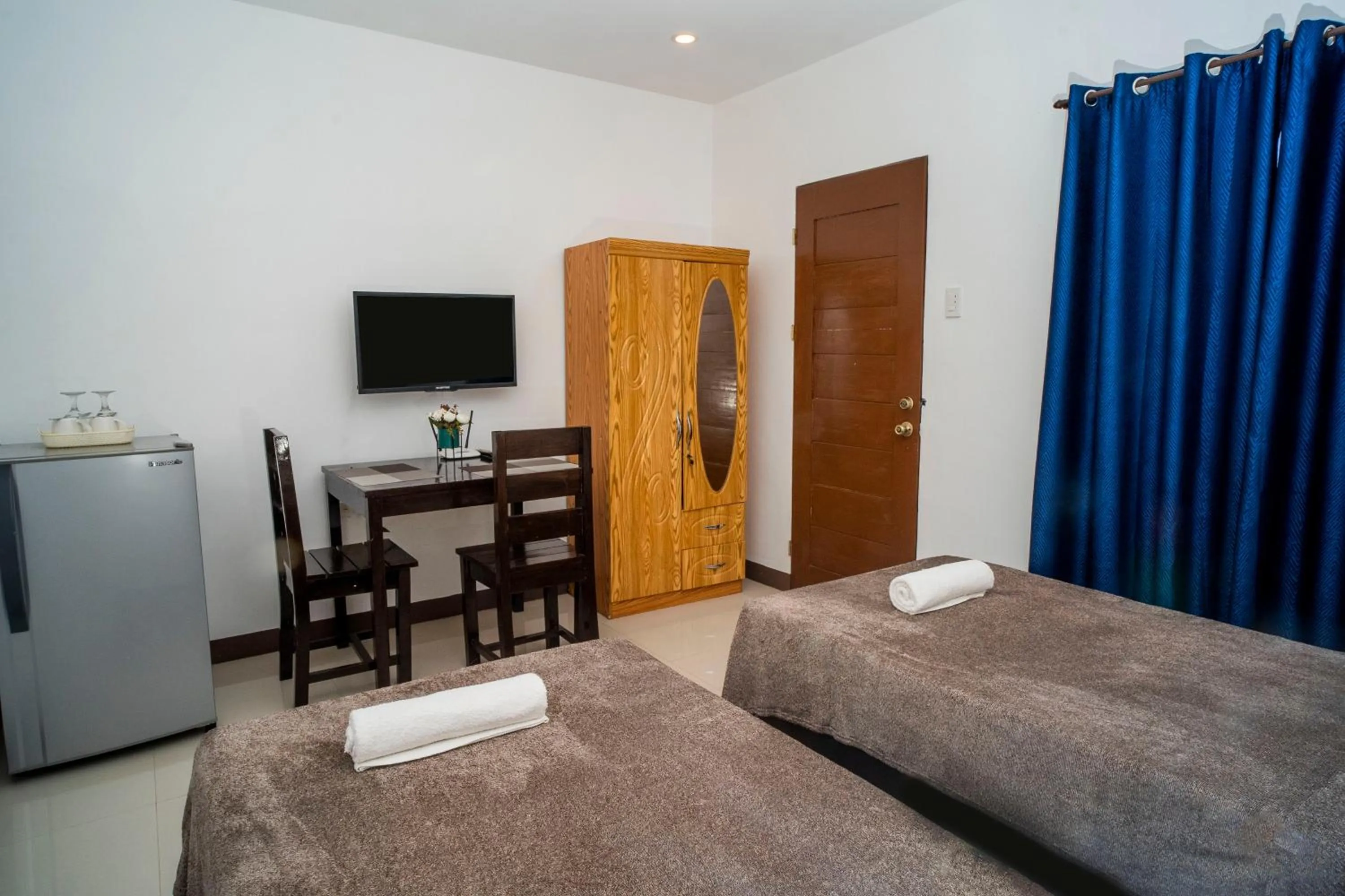 Bed in Panglao Village Court Apartment Stay Inn