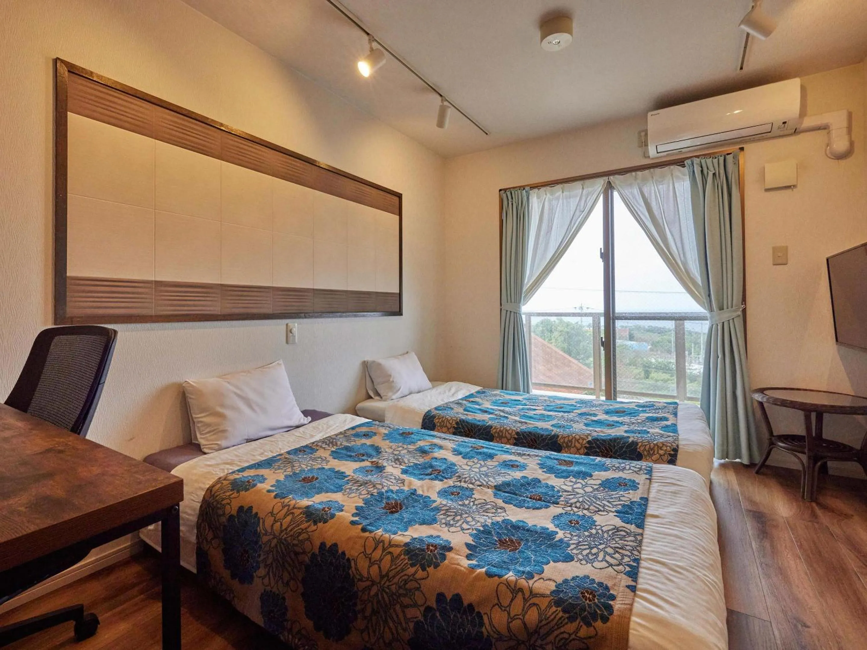 Photo of the whole room, Bed in Yukurina Resort Okinawa