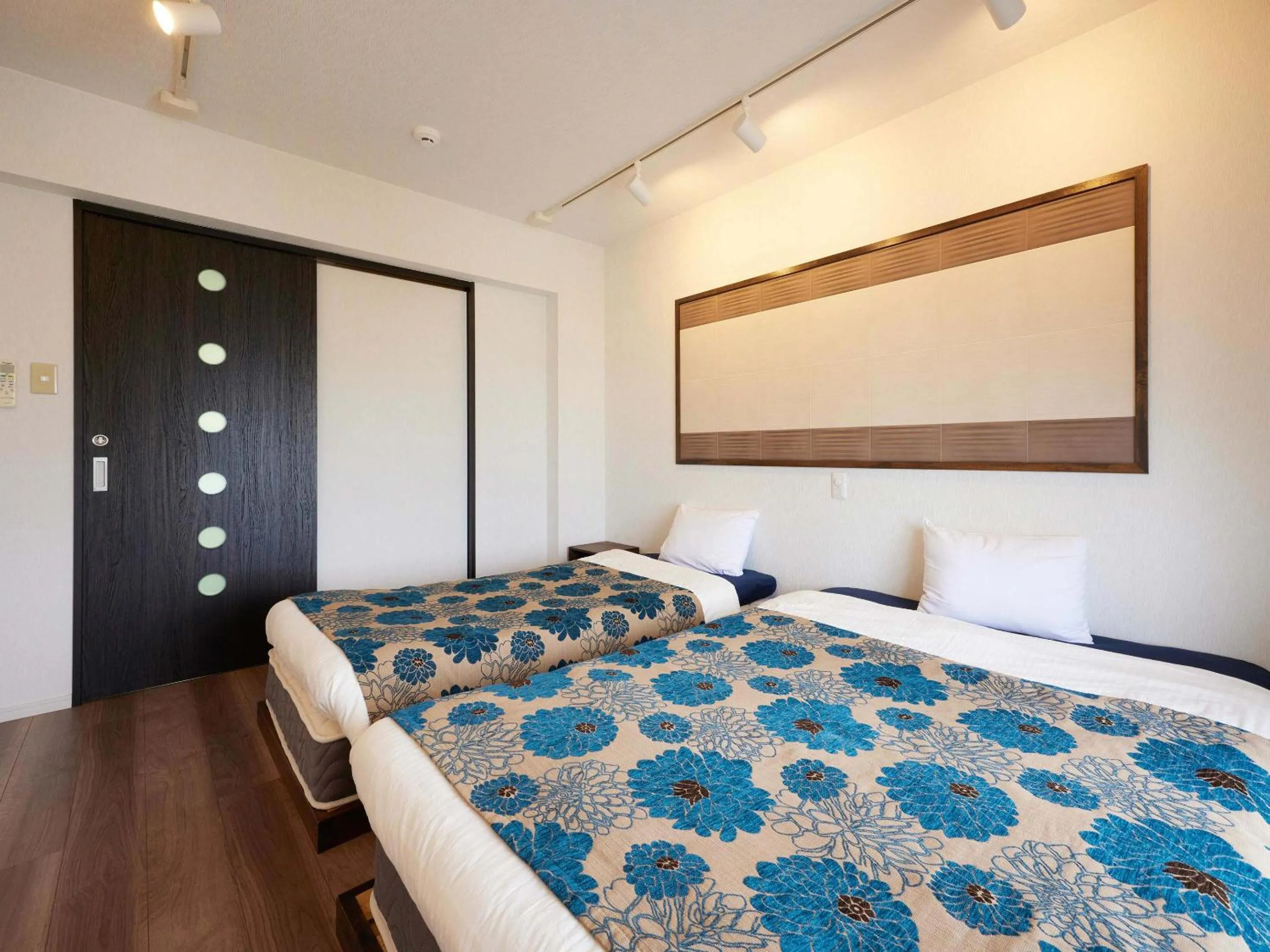 Photo of the whole room, Bed in Yukurina Resort Okinawa