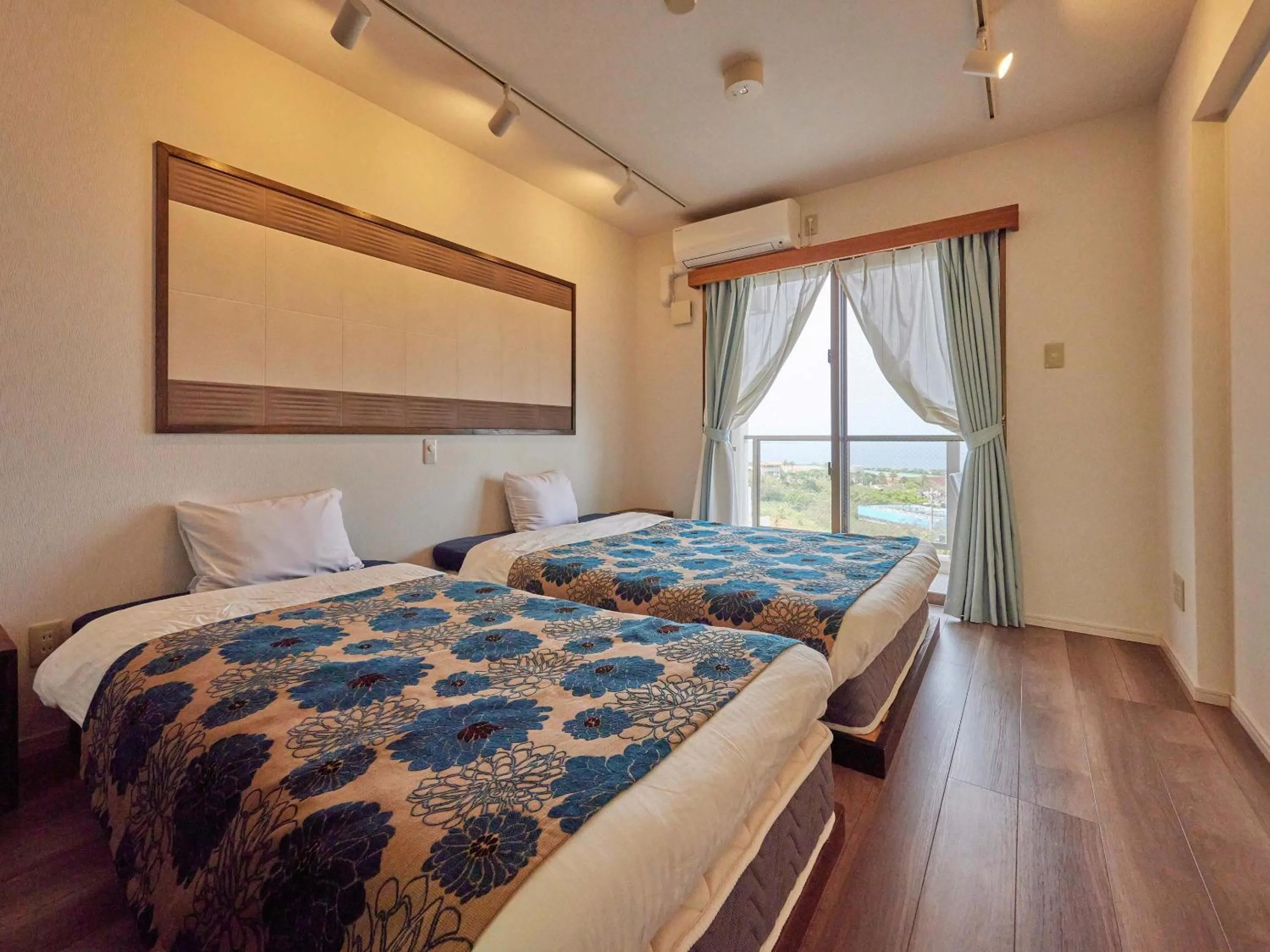 Photo of the whole room, Bed in Yukurina Resort Okinawa