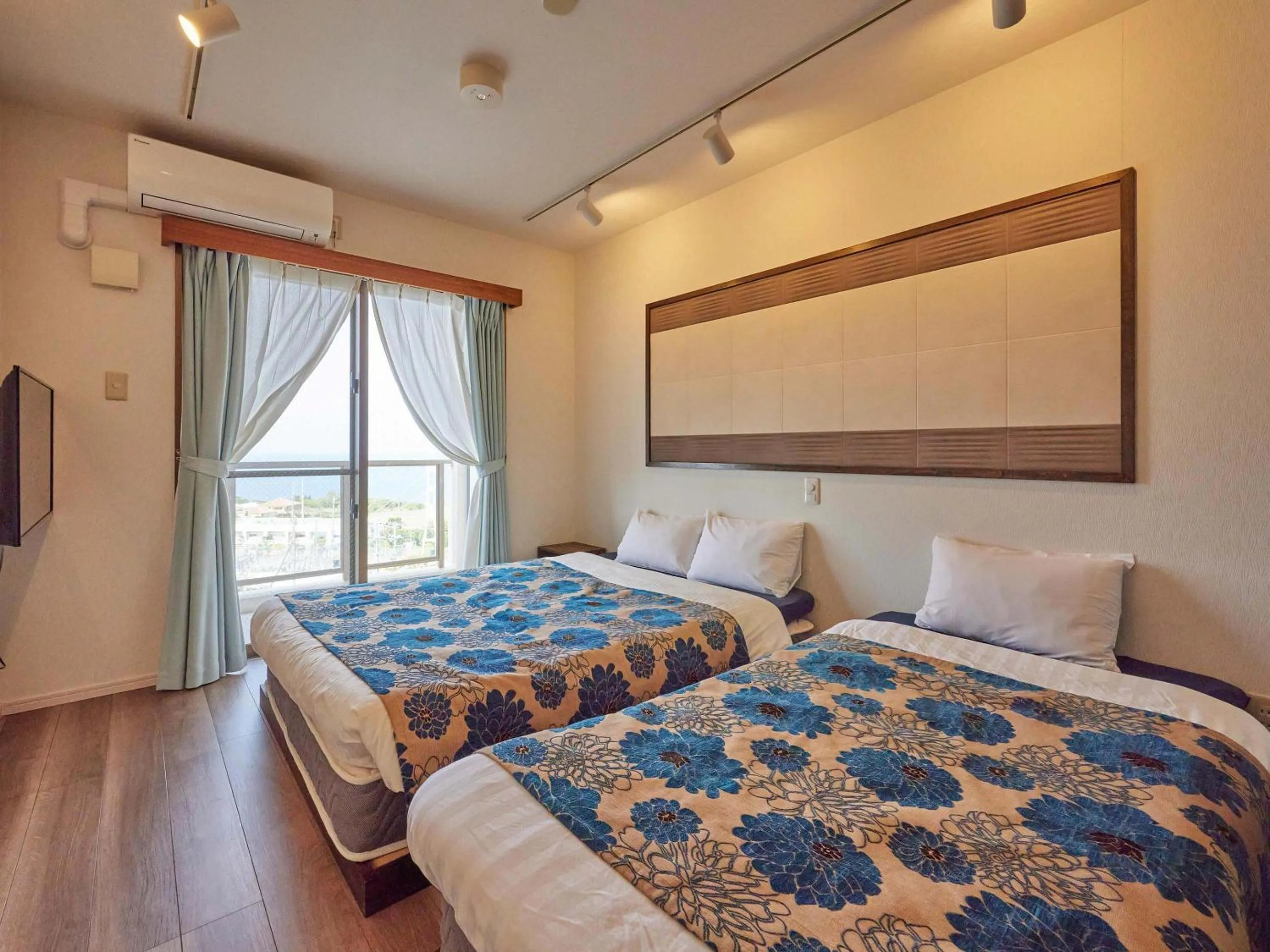 Photo of the whole room, Bed in Yukurina Resort Okinawa