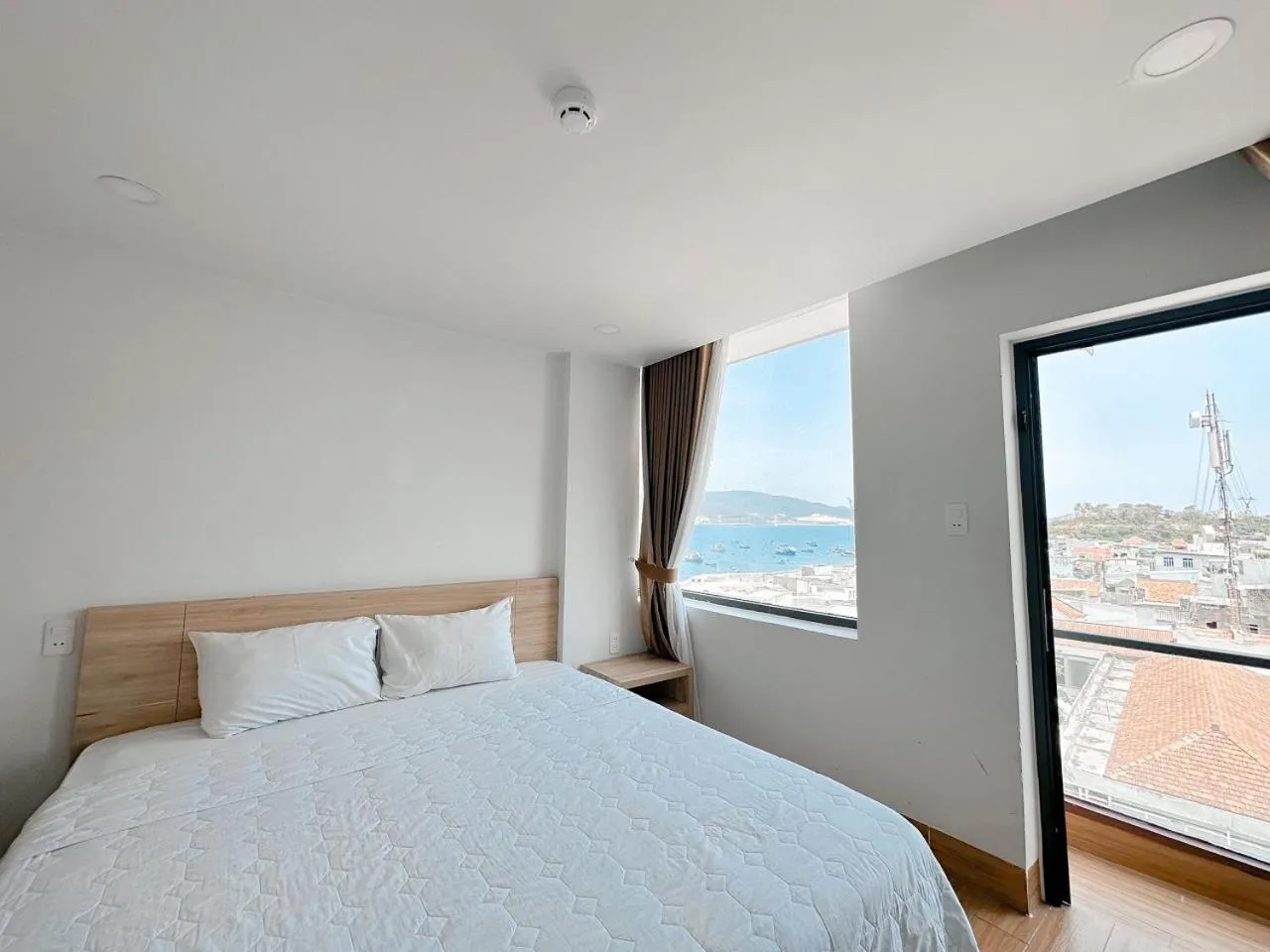 Bedroom, Bed in AQUA Seaview Hotel