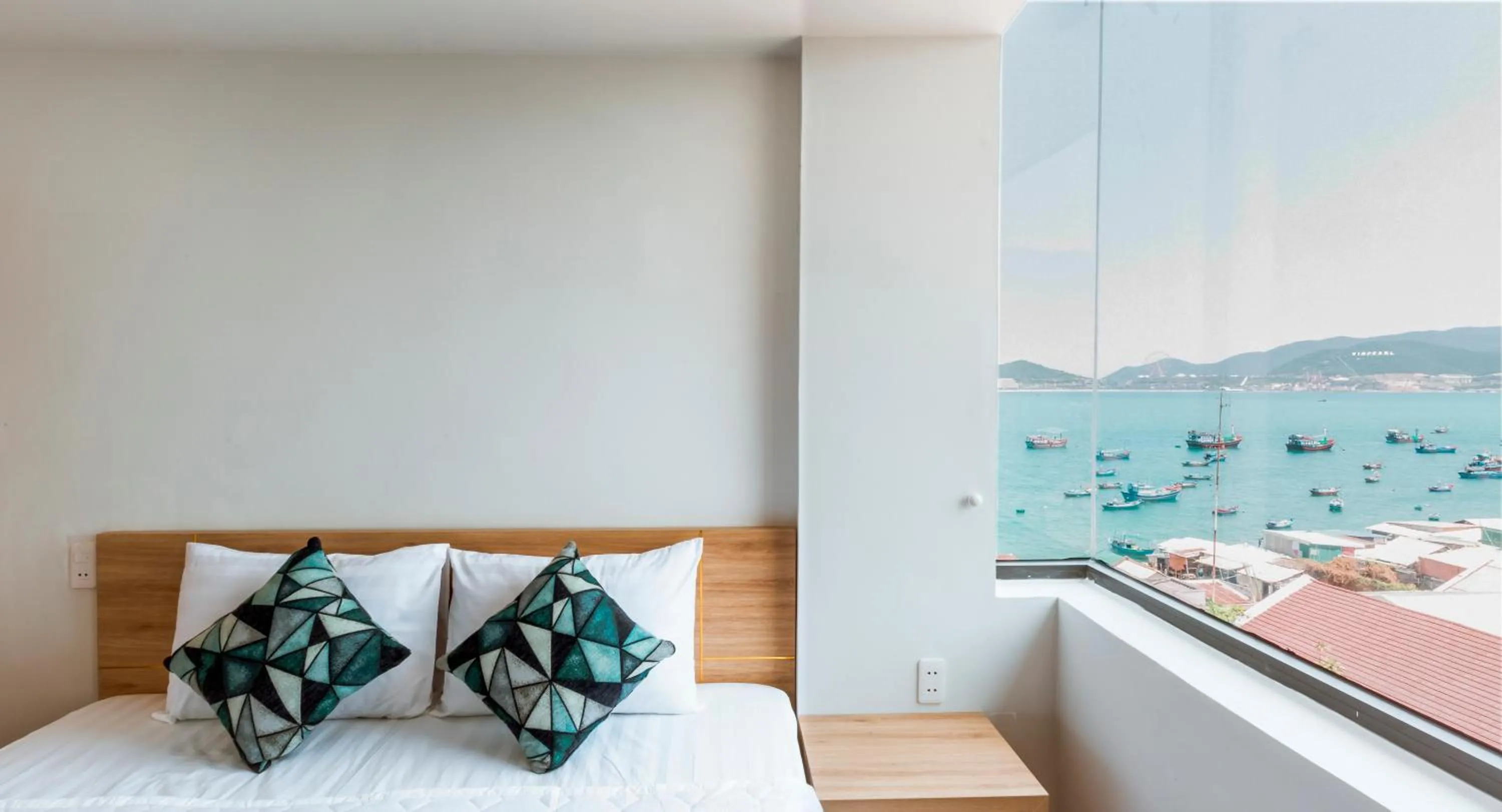 Bedroom, Bed in AQUA Seaview Hotel