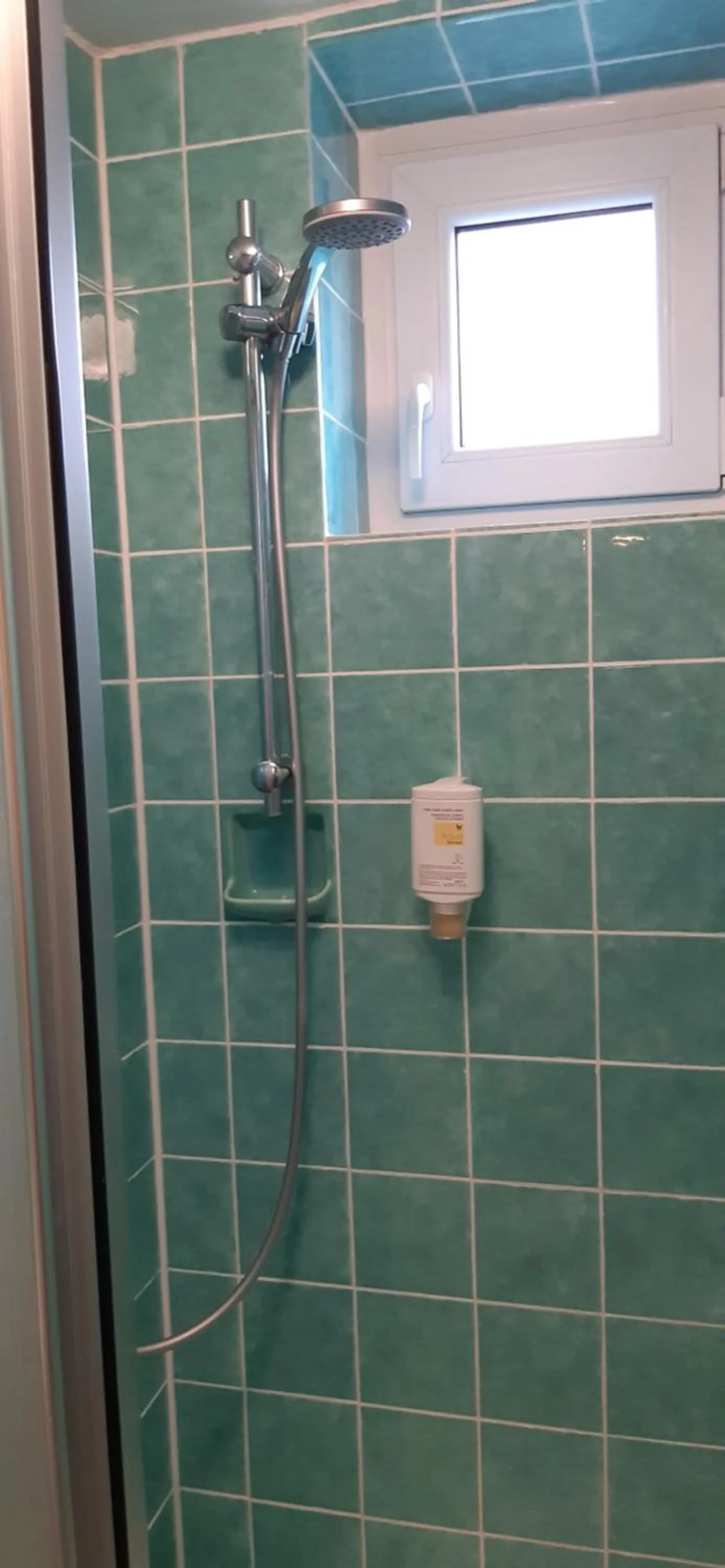 Shower in Alfa Apartment Hotel