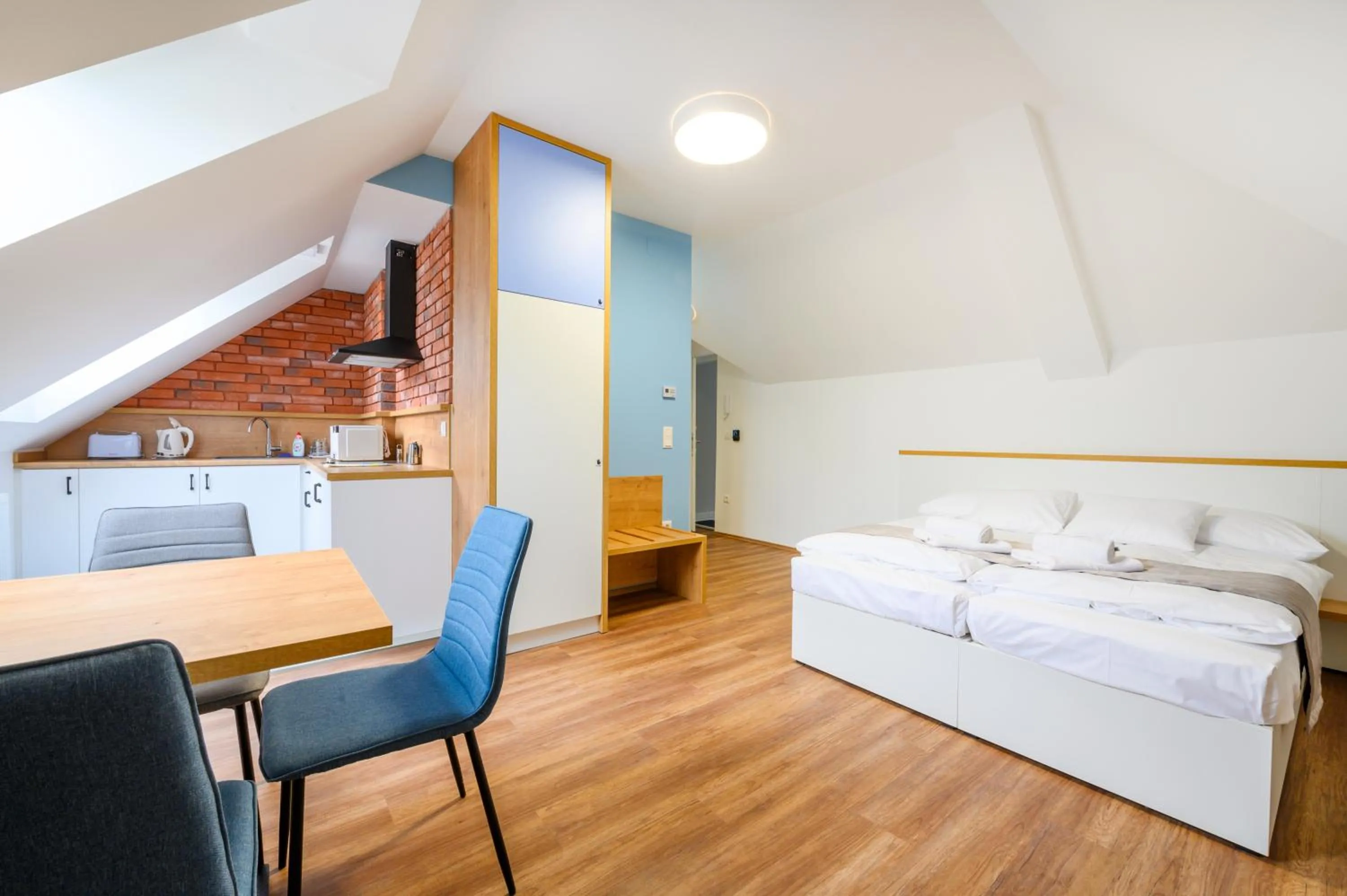 Living room, Bed in Berill Suites