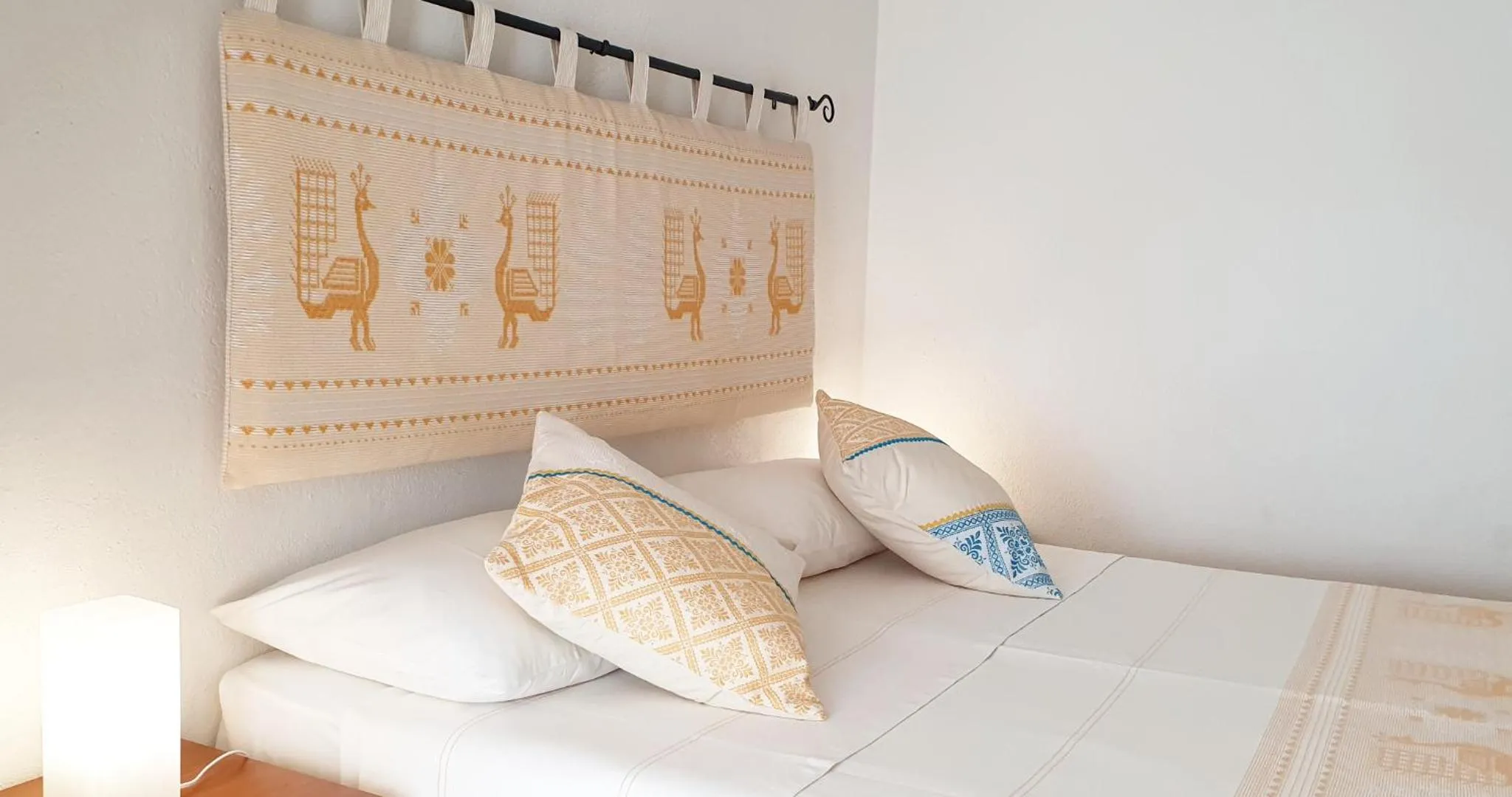 Decorative detail, Bed in Affittacamere Le Ginestre