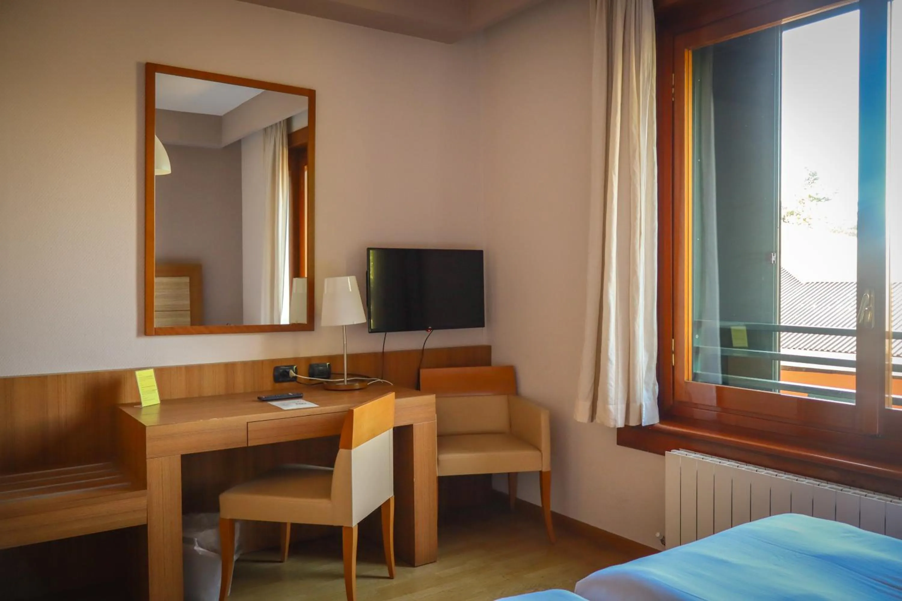 TV and multimedia, Bed in Monica Hotel Fiera