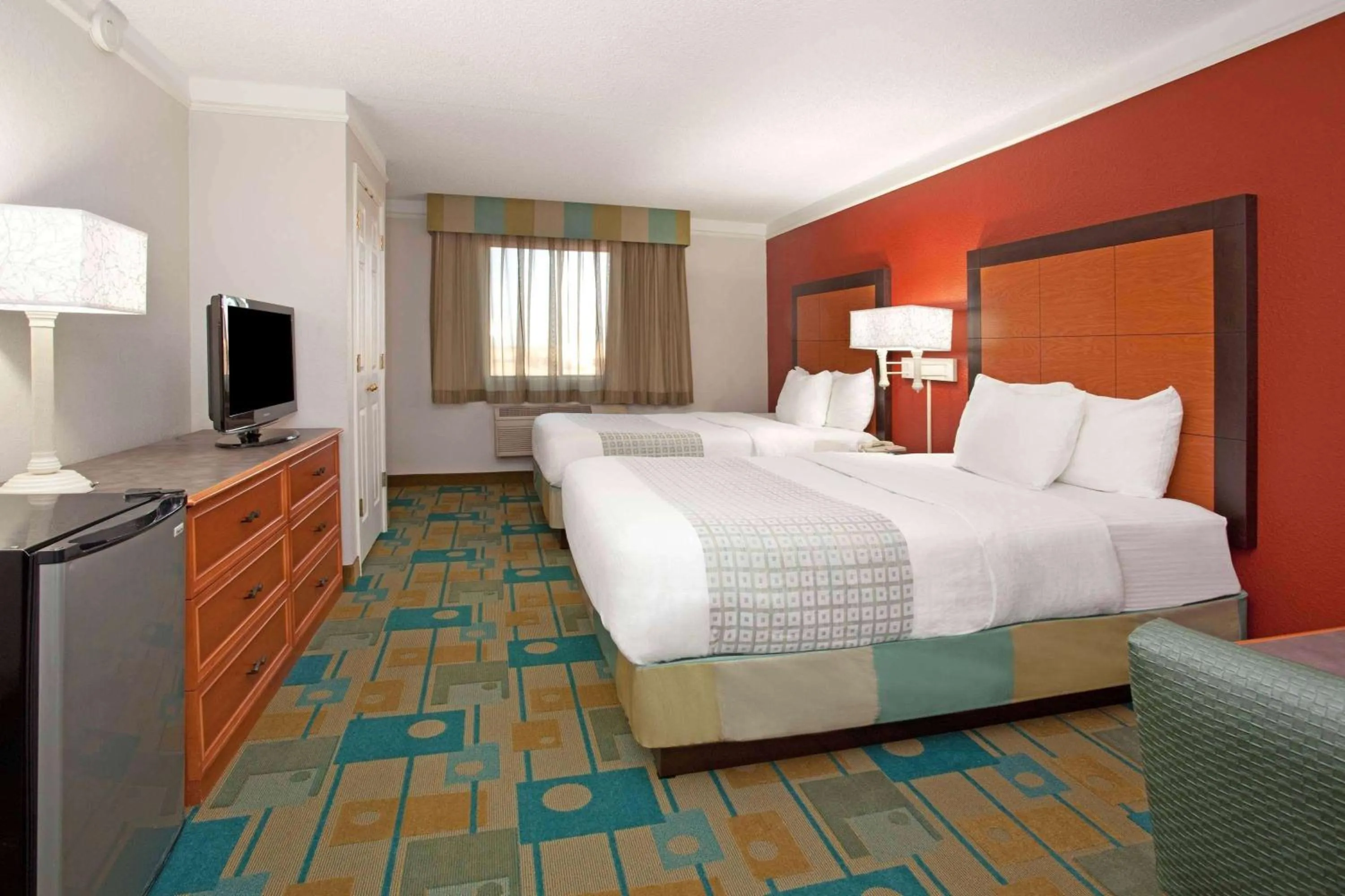 Photo of the whole room, Bed in La Quinta Inn by Wyndham Cheyenne