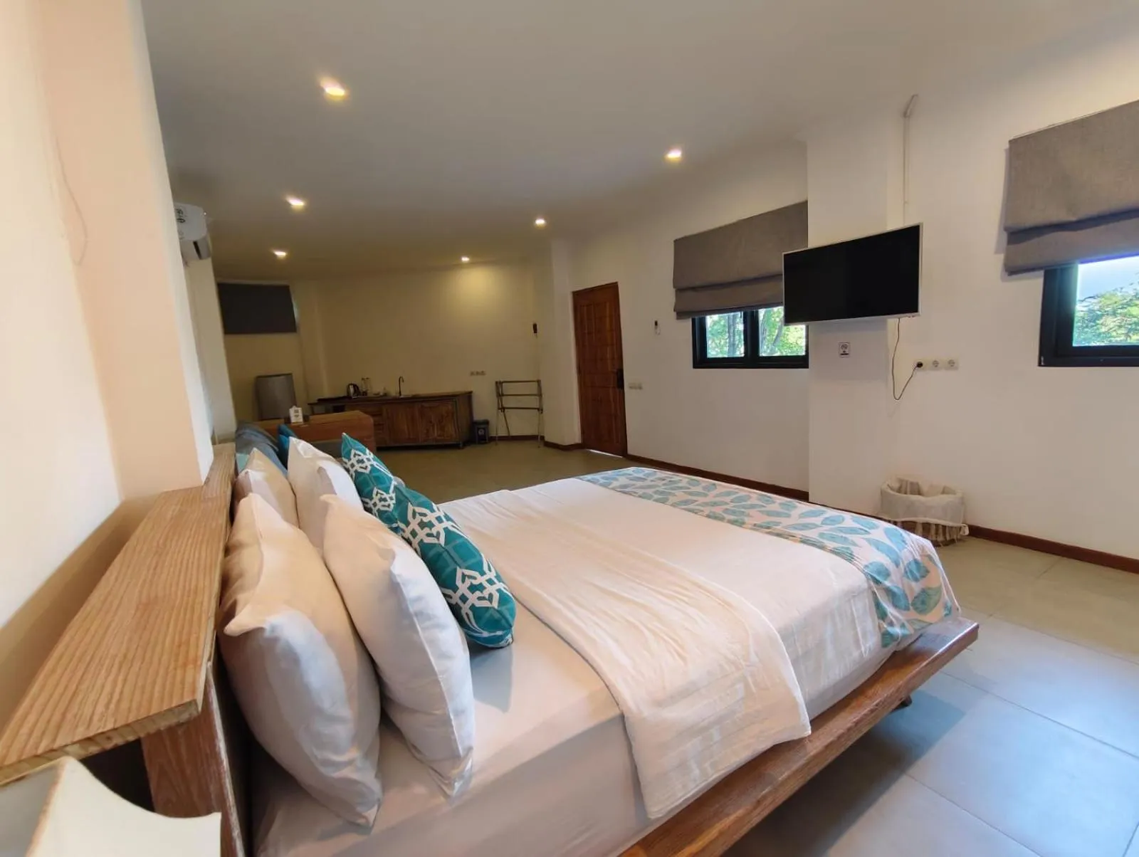 Bed in Triple 8 Suites