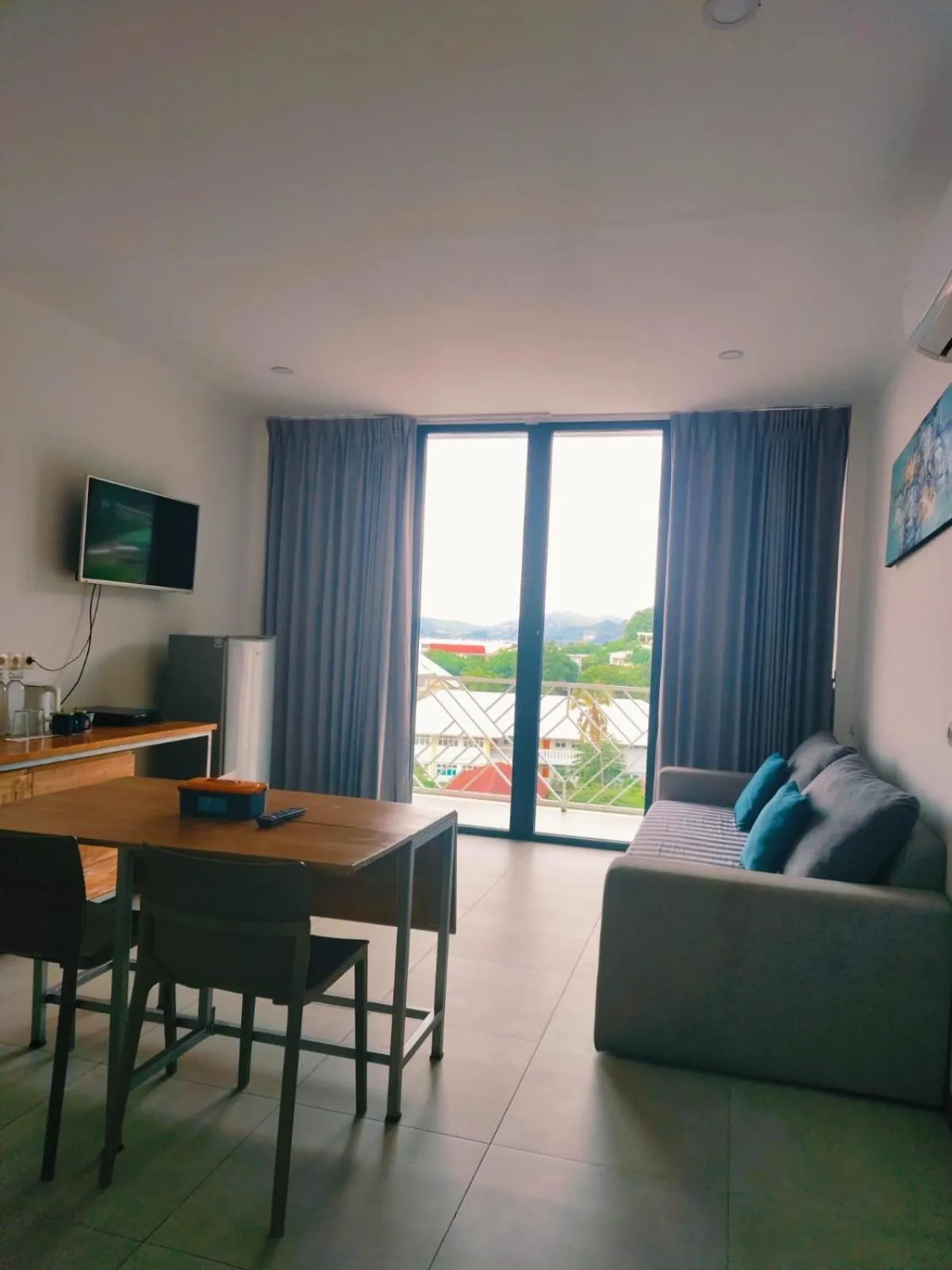 Communal lounge/ TV room in Triple 8 Suites