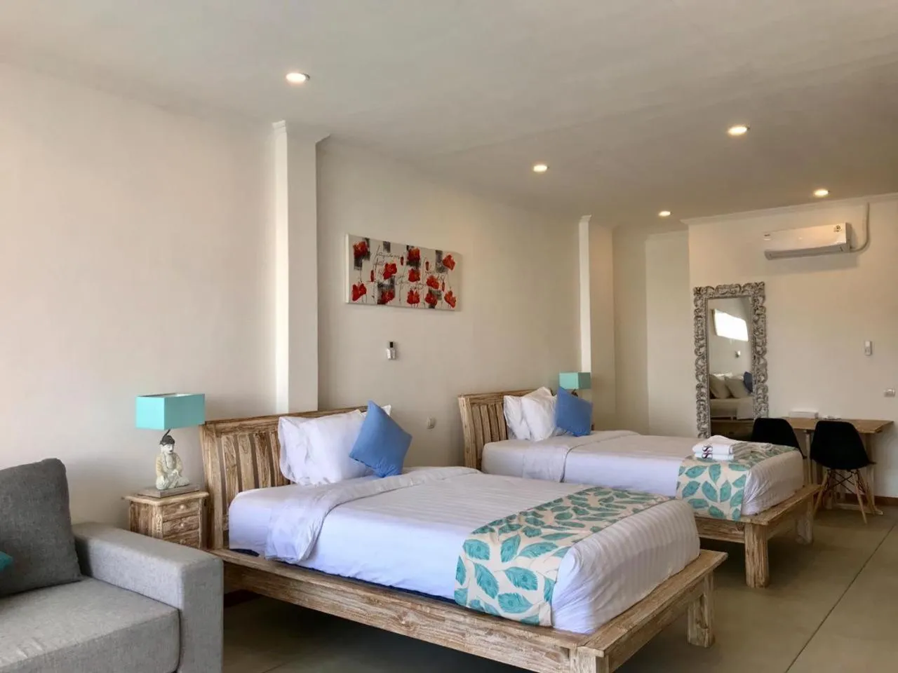 Bed in Triple 8 Suites