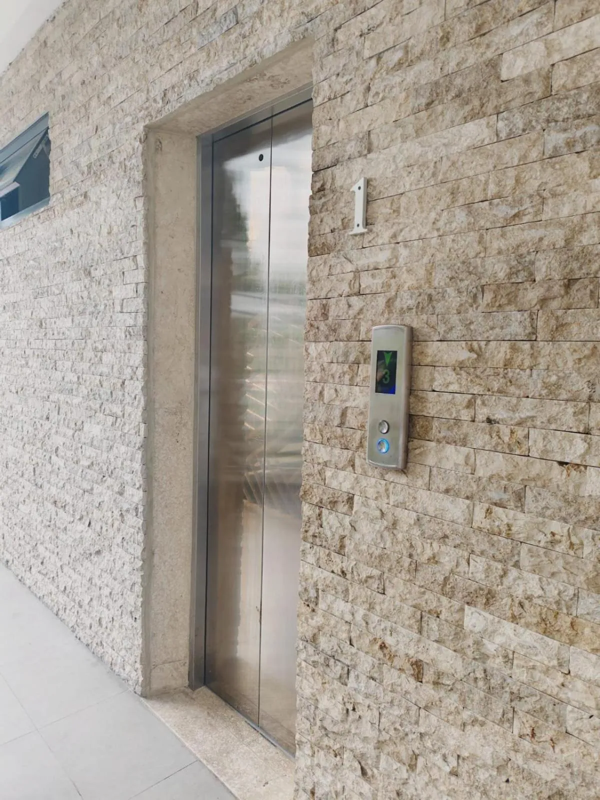 elevator in Triple 8 Suites