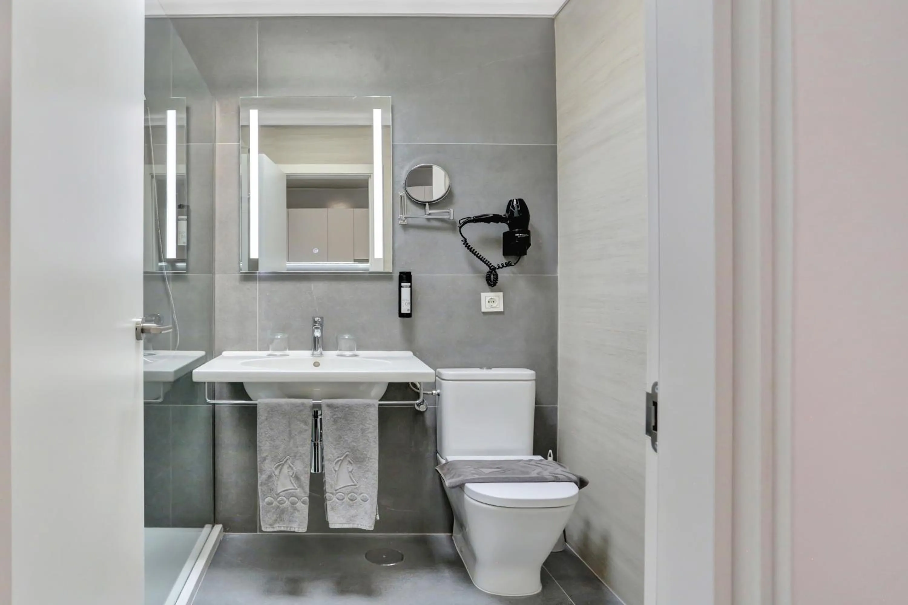 Shower in Apartamentos Garden & Sea Boutique Lodging by LIVVO