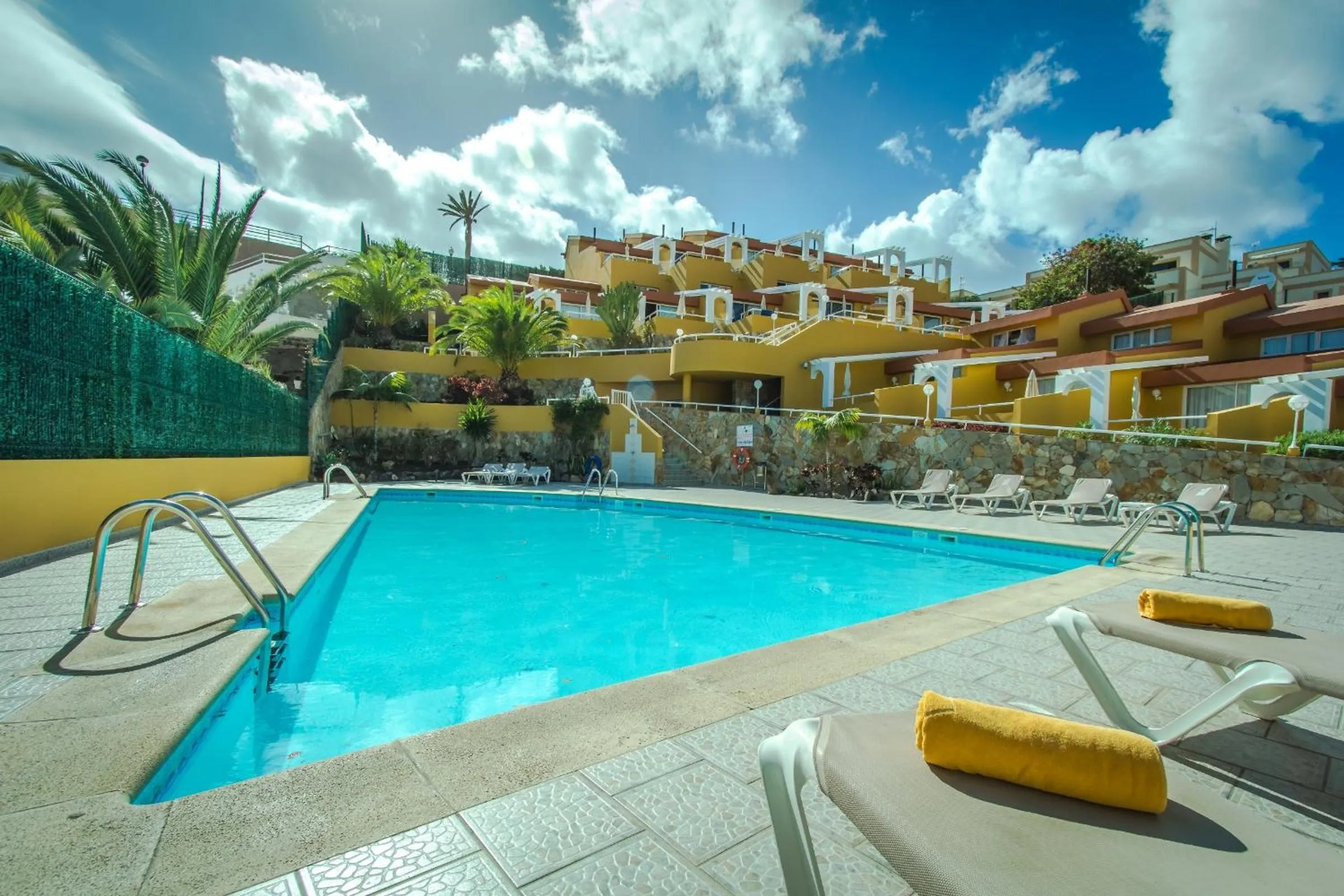 Swimming pool in Apartamentos Punta Marina by LIVVO