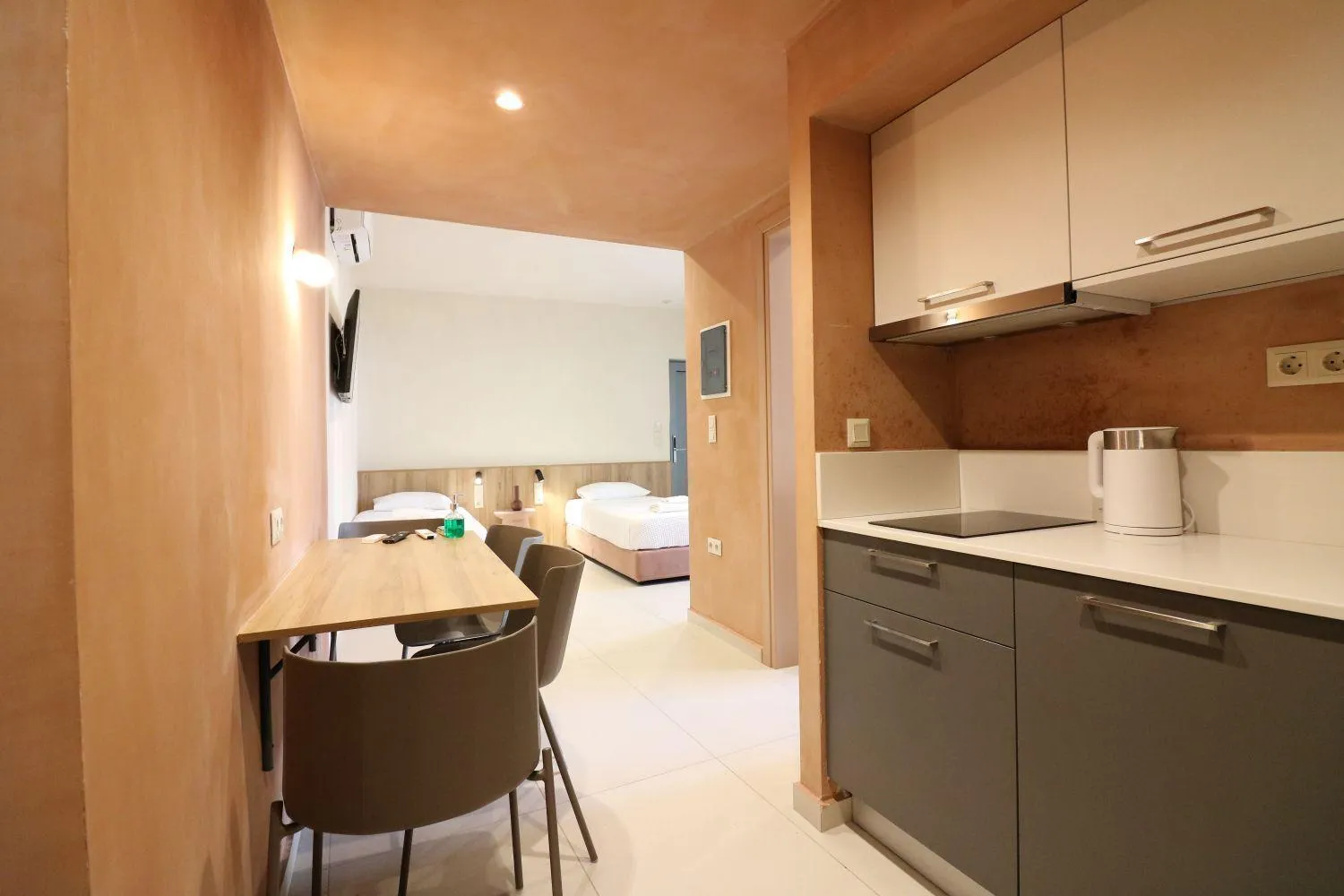 Bed in Philoxenia Apartments