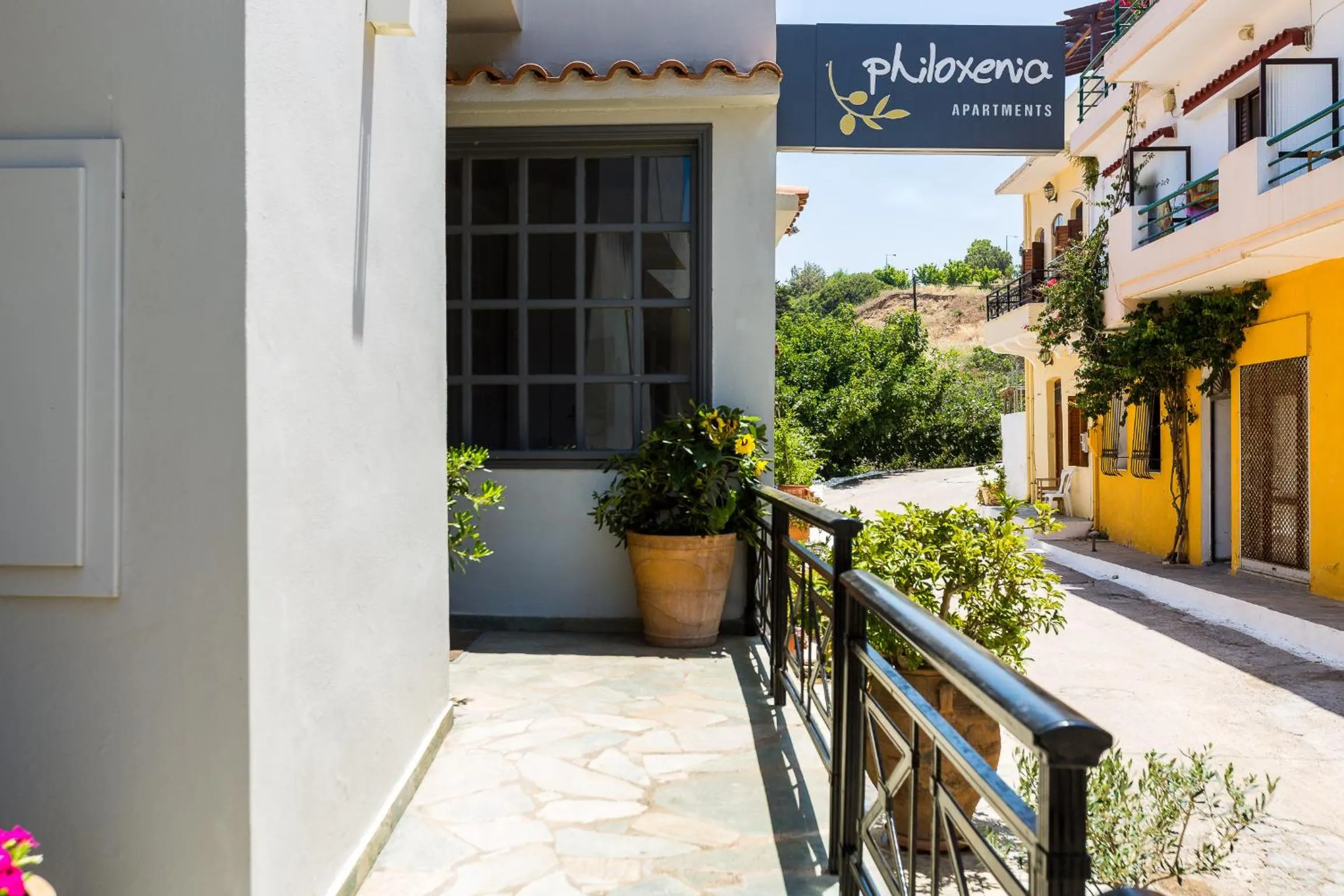 Property logo or sign in Philoxenia Apartments