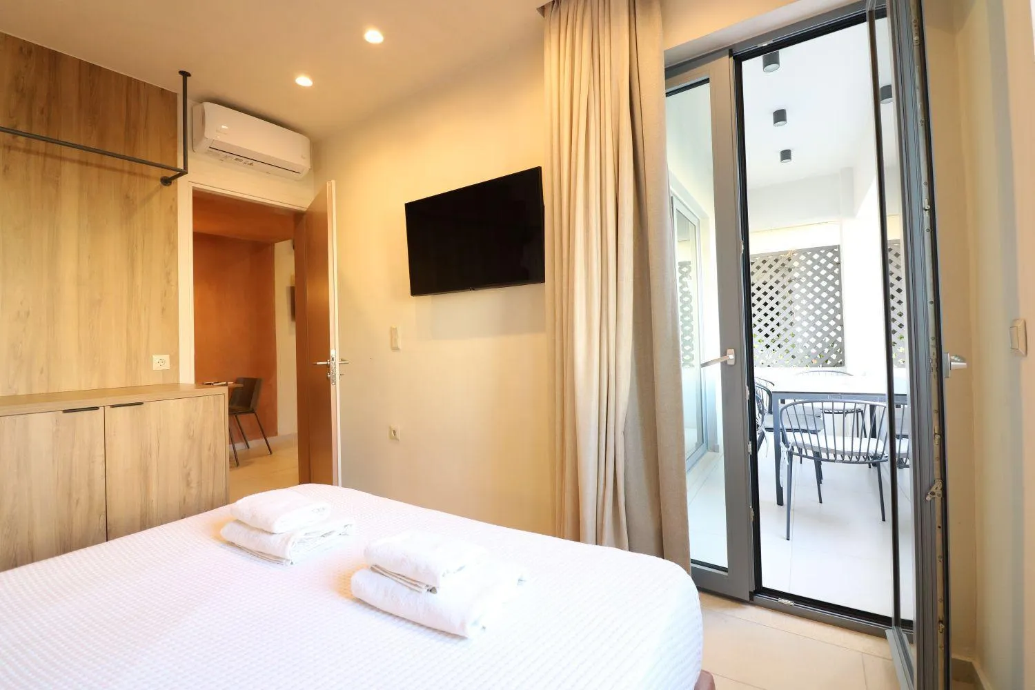 Bed in Philoxenia Apartments